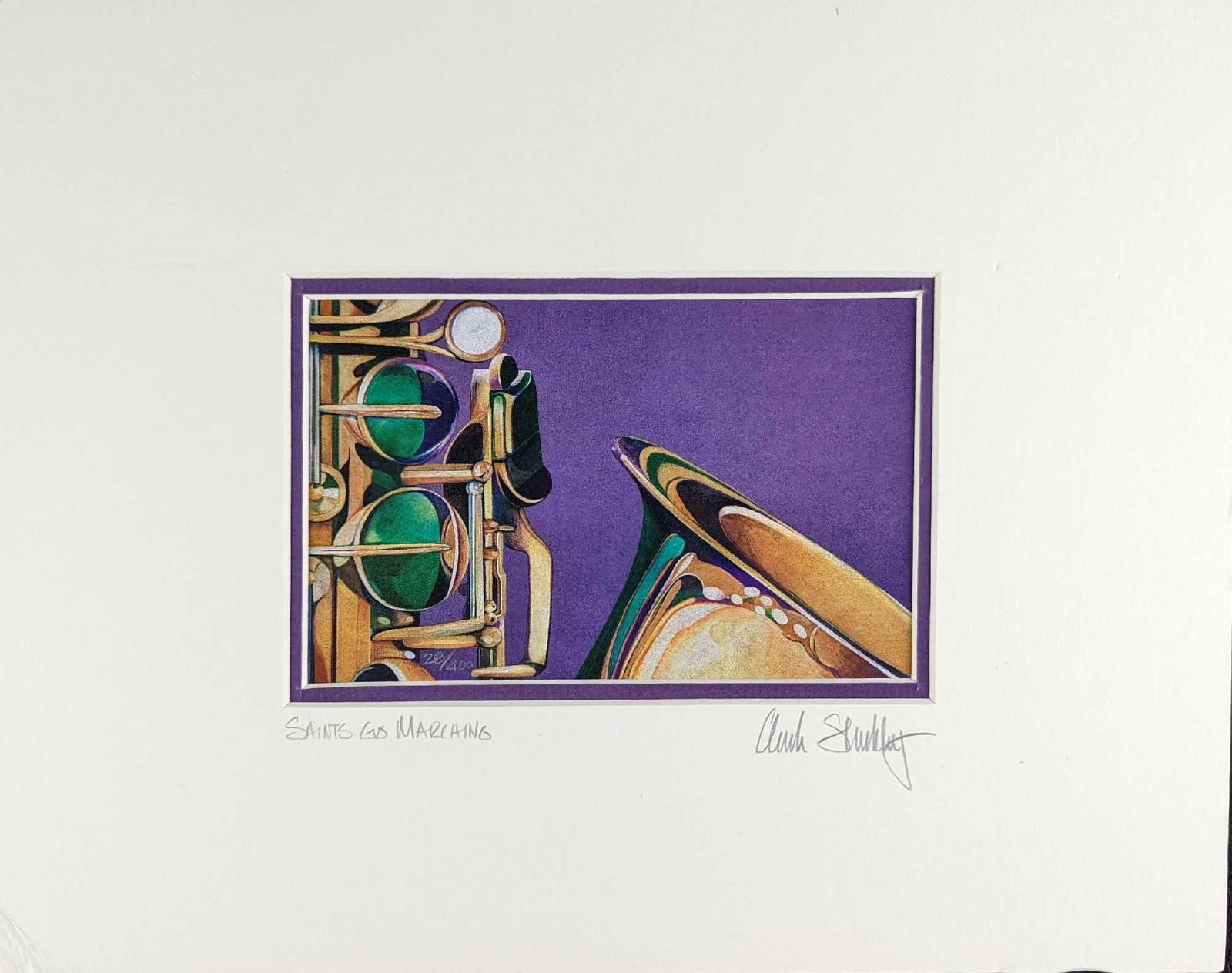 Limited Edition Saints Go Marching Matted Print: Limited Edition Print of "Saints Go Marching". This one is #28 out of #400. The matted print is approx 14" x 11" and it weighs 0.21lb. The print/image is approx 6 3/4" x 4 1/4". The matted print is in