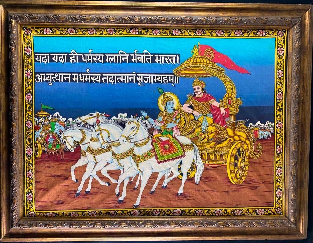 Vintage Bhagavad Gita Tapestry Framed: Vintage Bhagavad Gita Tapestry Framed Tapestry showing a scene from the Bhagavad Gita with Lord Krishna and Arjuna in a chariot pulled by white horses. Has sewn-on sequins as well to embellish the re