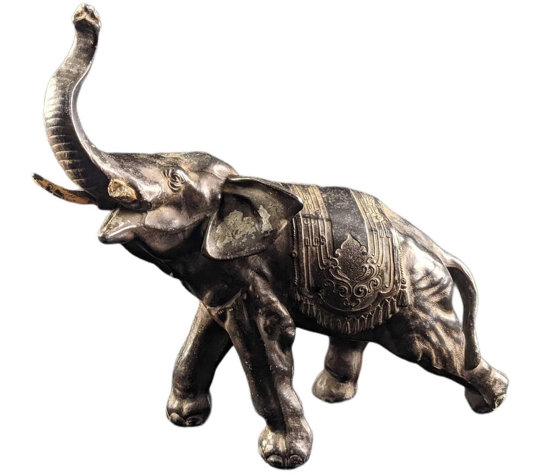 Hand Painted Vintage Tin Metal Trunk Up Elephant Figurine: Hand Painted Vintage Tin Metal Trunk Up Elephant Figurine. The maker and date of creation are unknown. Is approx 12" x 6" x 13 1/2" and it weighs 9lbs. The figurine is in a good, vintage condition wit