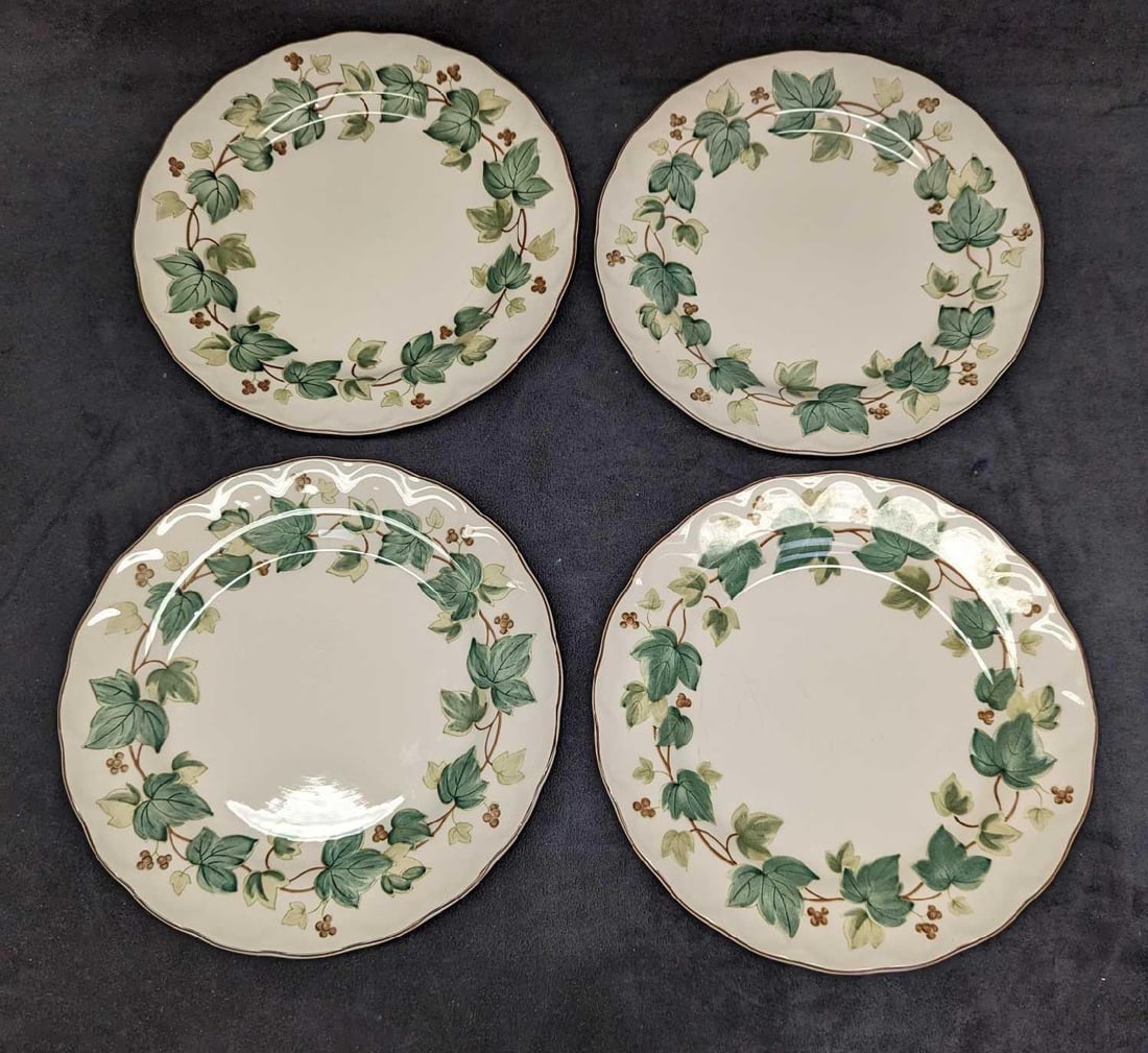 4 Retired Nikko Greenwood Dinner Plates B: 4 Retired Nikko Greenwood Dinner Plates B. This series was released from the year 1995 to the year 2004. Each is approx 10 1/4" x 10 1/4" x 1". The total weight is 5.83 lbs. One of the plates has some