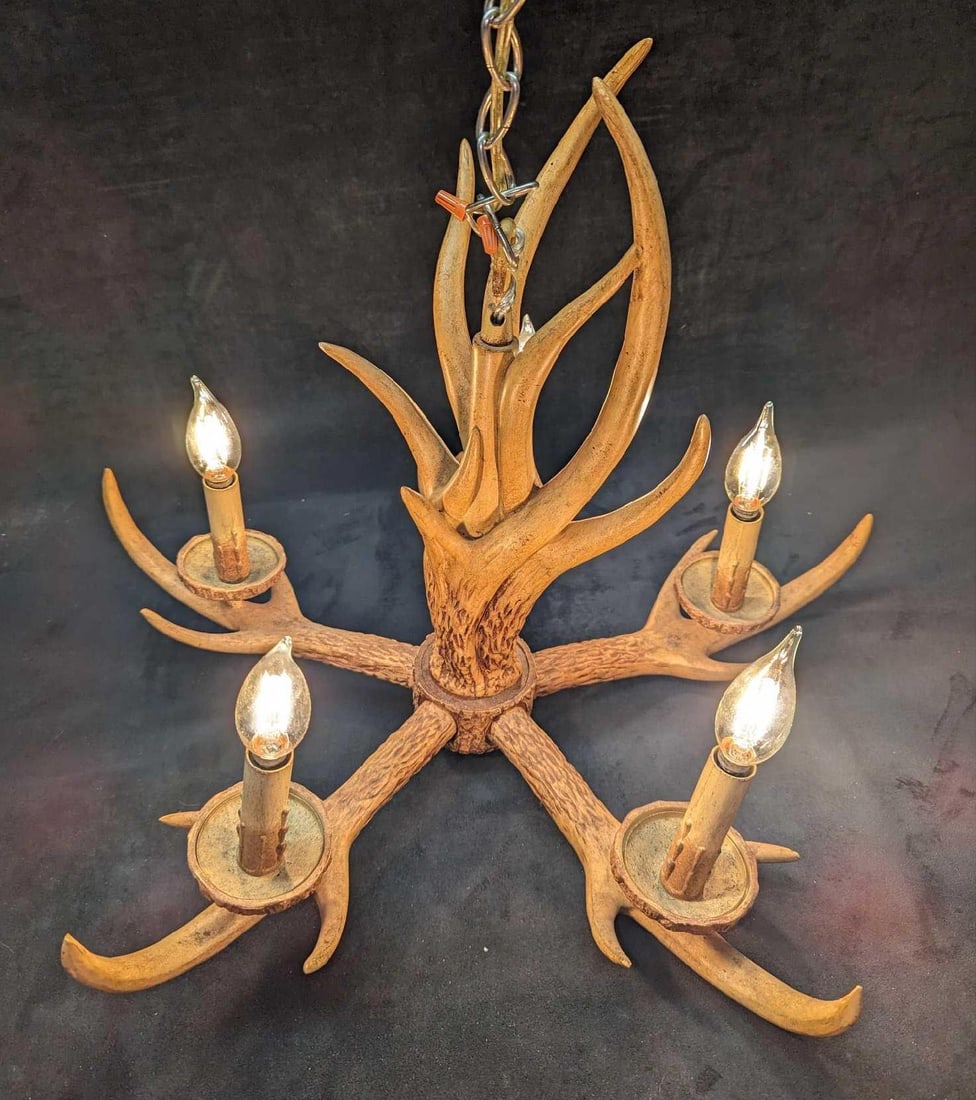 Ceiling Light Deer Antlers Resin 5 Light Chandelier: Ceiling Light Deer Antlers Resin 5 Light Chandelier. This is approx 24" x 24" x 18 1/2" and it weighs 11lbs. The chandelier was tested and it fully works. There are some signs of wear and chips at