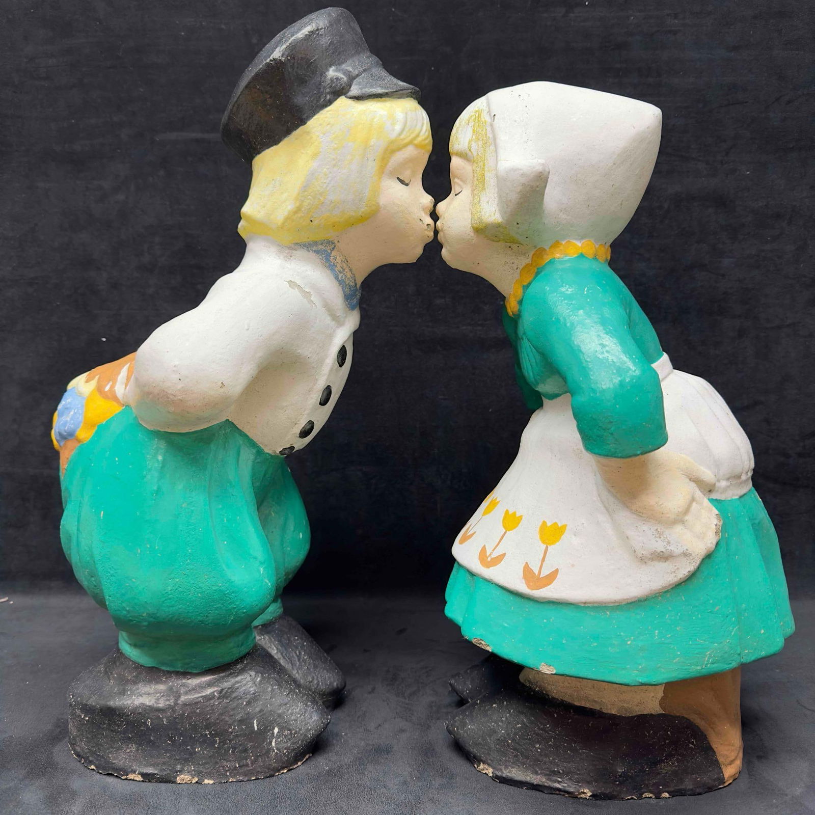 Dutch Boy and Girl Kissing Solid Concrete Garden Yard Outdoor Statue Set Couple Kiss Statues: Dutch Boy and Girl Kissing Solid Concrete Garden Yard Outdoor Statue Set Couple Kiss Statues. This couple yard garden statue set features a boy and girl kissing. Representing love these solid