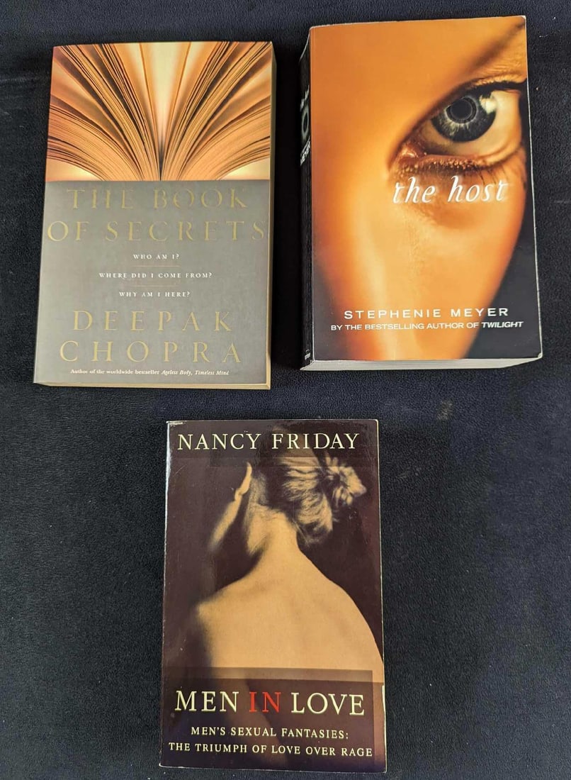 3 Paperback Books Men In Love Book Of Secrets The Host: This lot includes paperbacks: (1) Men In Love By Nancy Friday. This was published by Arrow Books (UK) in 2003. The book is approx 5" x 1 1/4" x 7 3/4". The book's first few pages