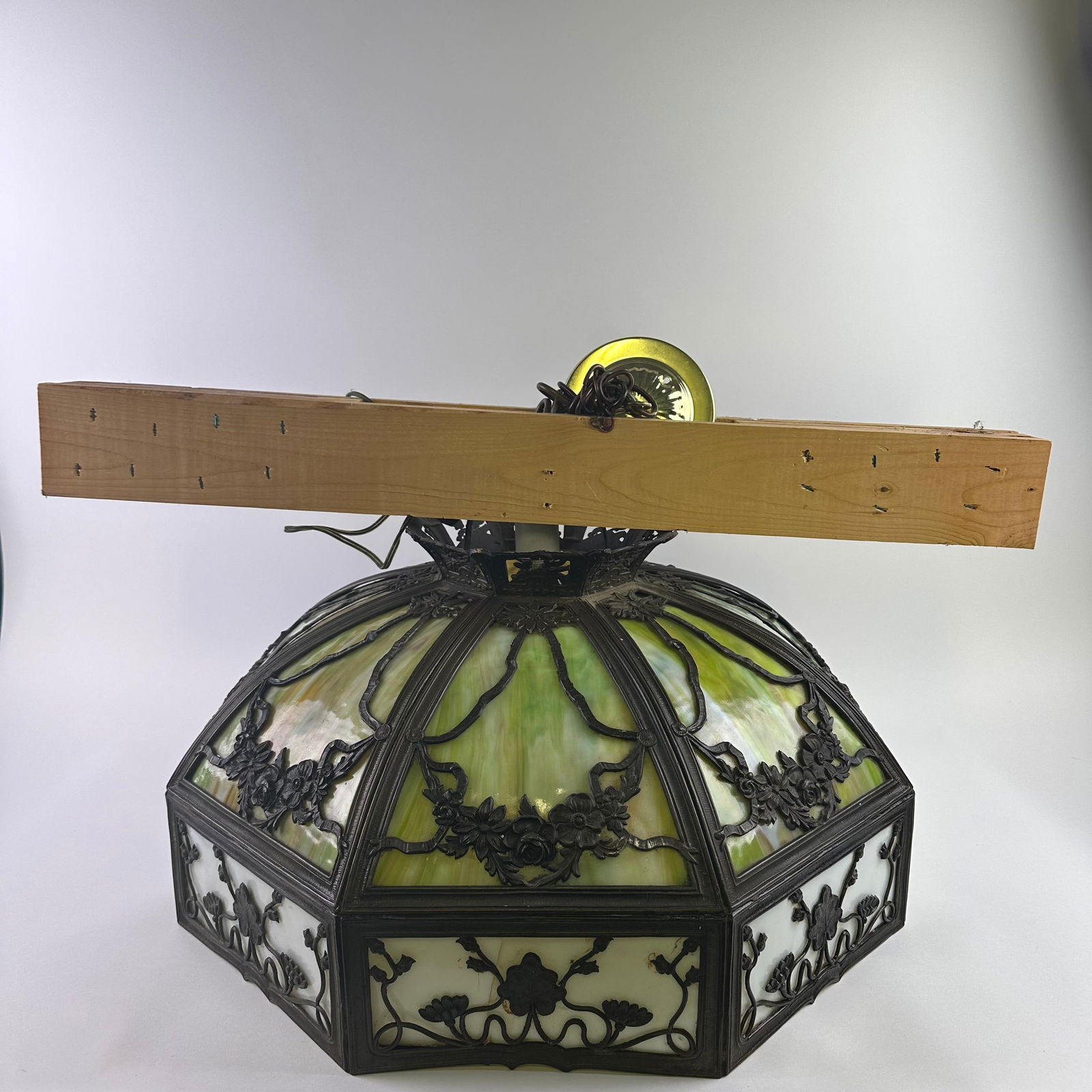 Antique Octagonal Slag Glass Green White Panel Hanging Lamp Floral Metal Filigree Frame Light: Antique Art Nouveau style slag glass hanging lamp with green and white glass panels and decorative filigree overlay, metal floral pattern frame overlay. The shade incorporates panels of marbled slag