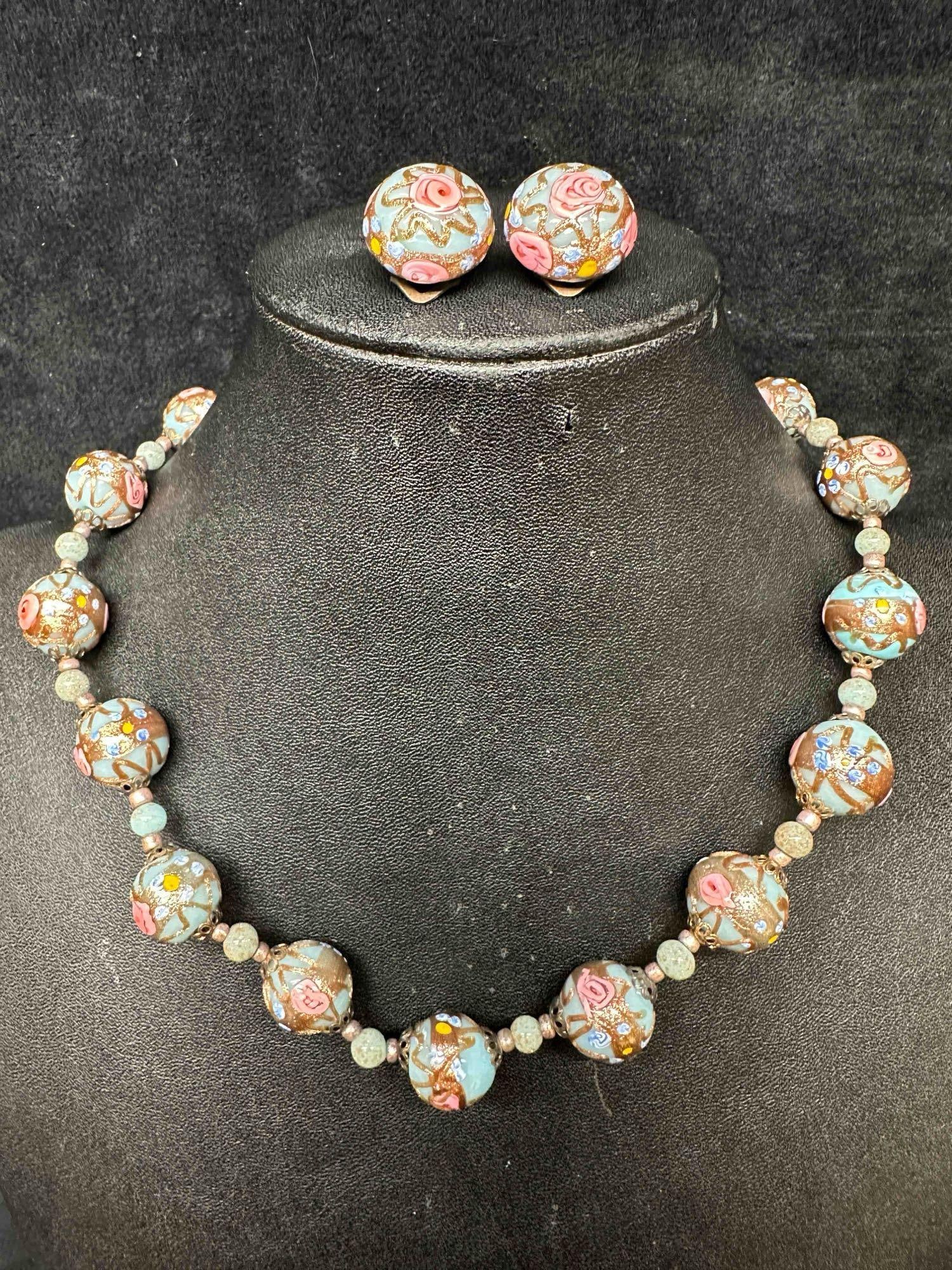 Murano Venetian Lamp Work Glass Light Blue Copper Accent Beaded Necklace and Earrings Set F18: Murano Venetian Lamp Work Glass Light Blue Copper Accent Beaded Necklace and Earrings Set F18. Necklace and earrings with light blue colored glass beads with beautiful hand painted floral designs on