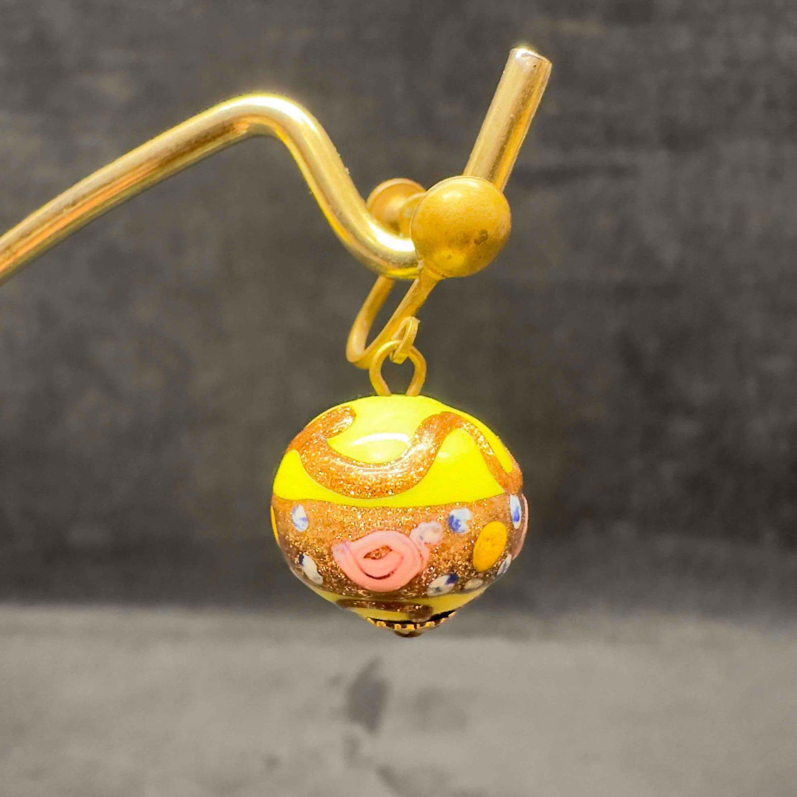 Murano Venetian Art Glass Lamp Work Yellow Floral Pink Copper Accent Round Bead Drop Earrings F29: Murano Venetian Art Glass Lamp Work Yellow Floral Pink Copper Accent Round Bead Earrings F29. Earrings with yellow glass beads with beautiful designs on each. The earrings feature pink floral and copp