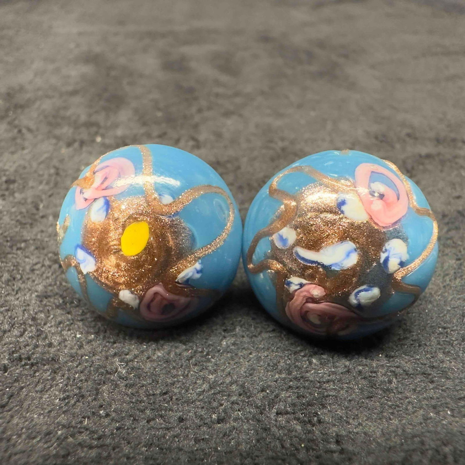 Murano Venetian Art Glass Lamp Work Teal Blue Floral Copper Accents Circle Bead Earrings F37: Murano Venetian Art Glass Lamp Work Teal Blue Floral Copper Accents Circle Bead Earrings F37. Earrings with teal blue glass beads with beautiful designs on each. The earrings feature floral and