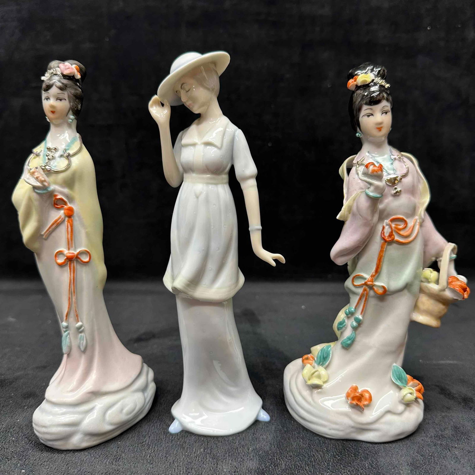Porcelain Ceramic Figurines Geisha Women and Blue Hat Lady Set China Figures R153: Porcelain Ceramic Figurines Geisha Women and Blue Hat Lady Set China Figures. Some of the figures have light breaks in the porcelain. These items are in pre-owned, previously displayed condition with