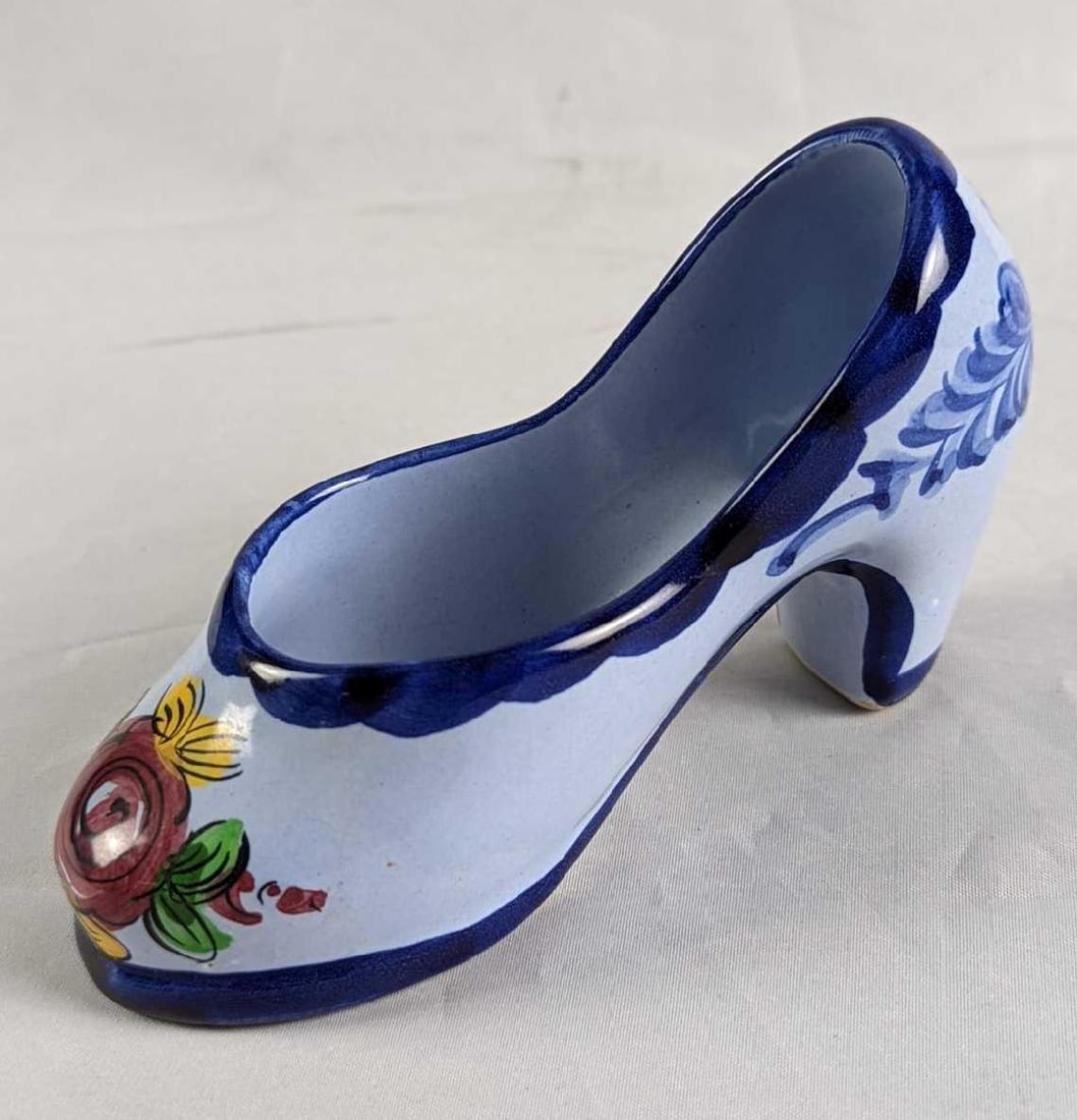 Vintage Hand Painted Floral Ceramic Shoe Figurine: Vintage Hand Painted Floral Ceramic Shoe. Made in Portugal. The shoe figurine is approx 2" x 5" x 2 3/4" and it weighs 0.21lb. The shoe figurine is in good, vintage condition with signs of light wear.