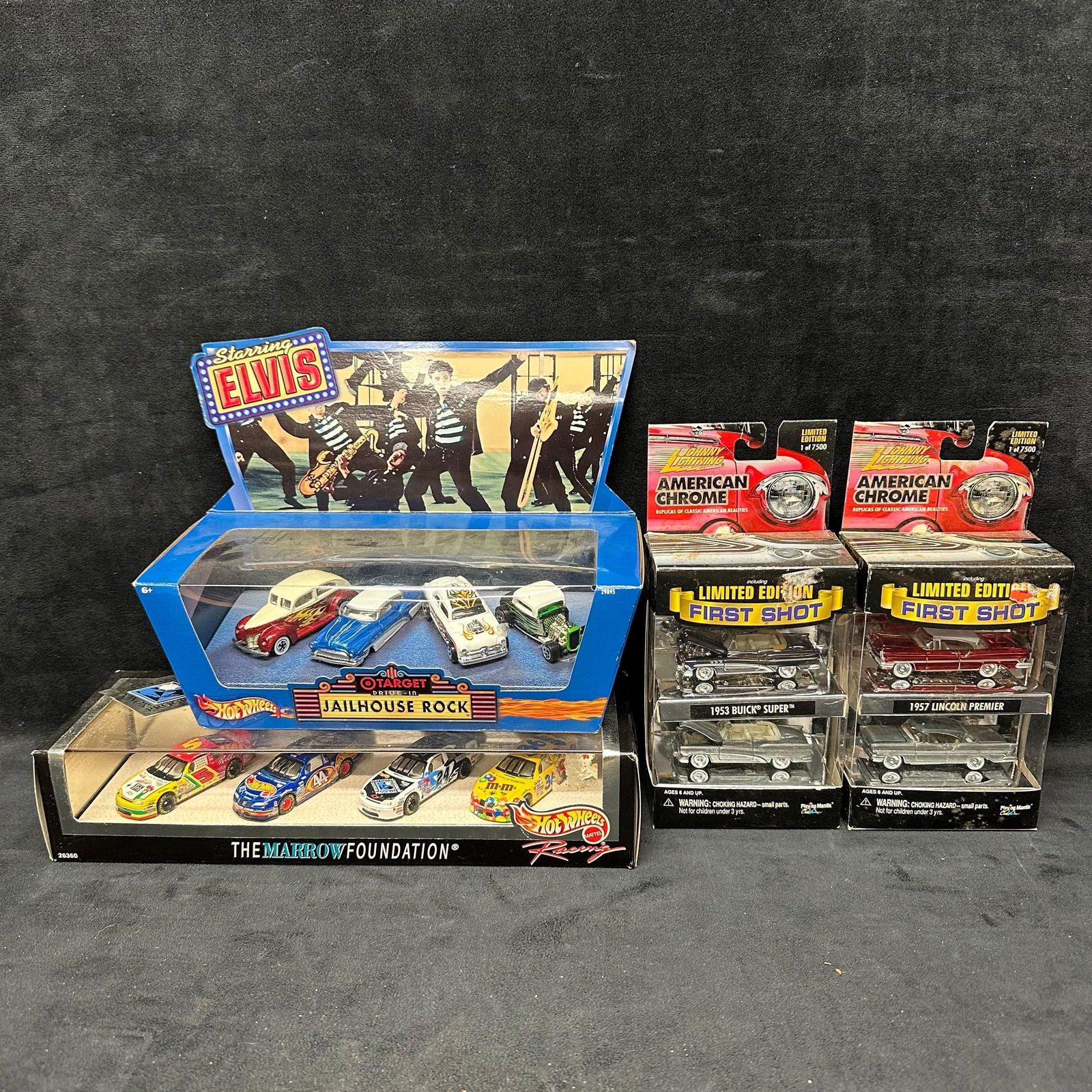 Johnny Lightning Hot Wheels Four Collector Sets Elvis American Chrome: Group of four collectible die-cast sets, including Hot Wheels Jailhouse Rock Elvis Drive-In Set, Hot Wheels Marrow Foundation 4-Car Racing Set, and two Johnny Lightning American Chrome First Shot Limi
