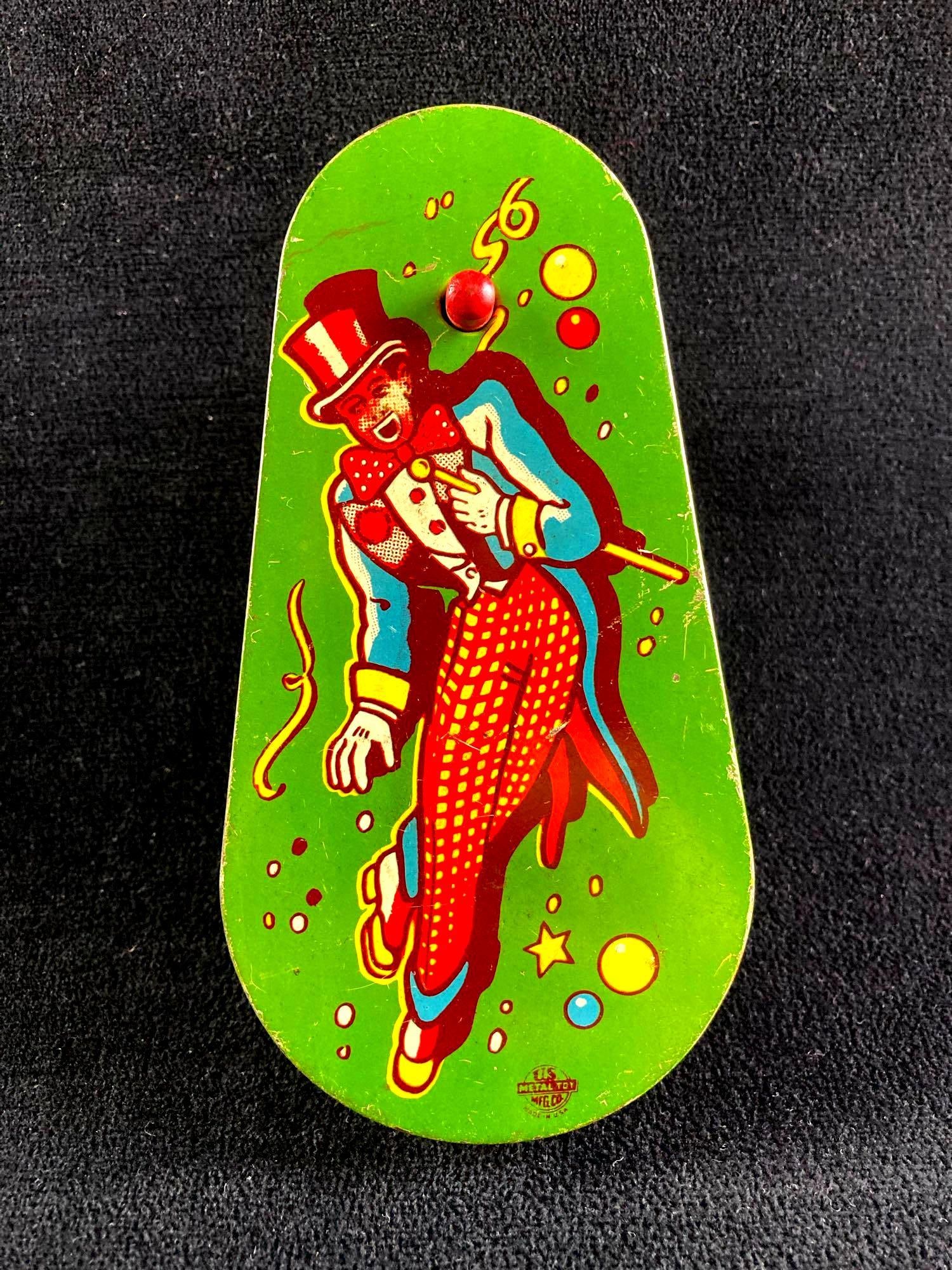 US Metal Manufacturing Company Noisemaker Toy: This lot includes: (1) US Metal Manufacturing Company Noisemaker Condition is used and see photographs for additional details. The noisemaker still works and there are no evident missing parts