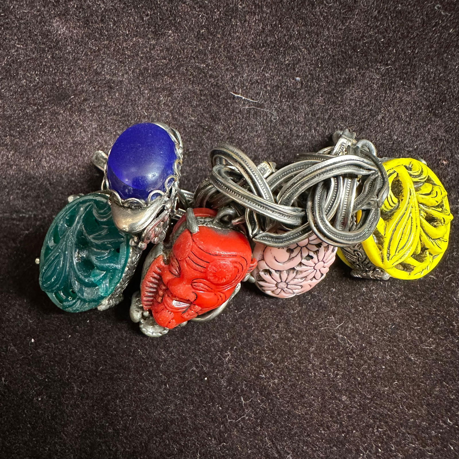 Unsigned Selro Selini Style Chunky Mulit Charm Heavy Twisted Bracelet: No hallmarks. This item is in good pre-owned, previously displayed condition with light wear and surface scratches. Please reference all photos for full details. Bracelet: 8 1/2". Weight: 0.2