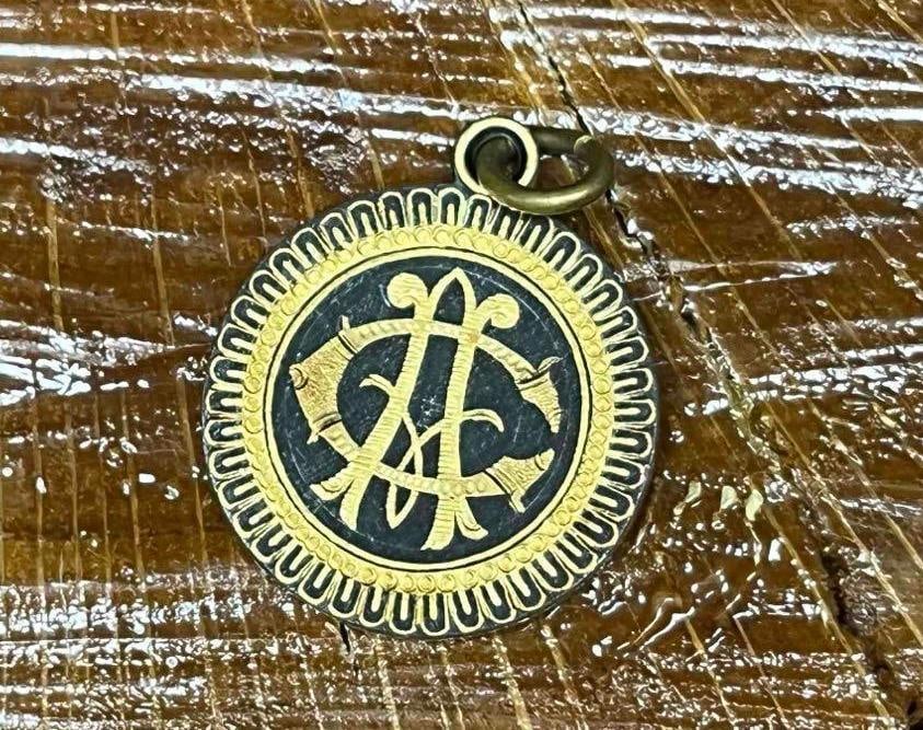 Monogram Necklace Pendant: This lot contains a Monogram Necklace Pendant. The approx. weight and dimensions are listed below. Overall the pendant is in good pre owned condition with some wear from aging/use. Please reference al