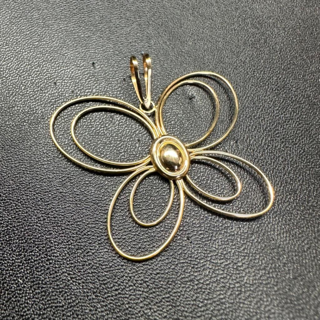 14k Gold Butterfly Pendant: This piece of jewelry has been tested and researched prior to listing. Please view all our pictures they are part of our description. DETAILS: Metal - 14k Gold Color - Yellow Gold Stones - none Hallm