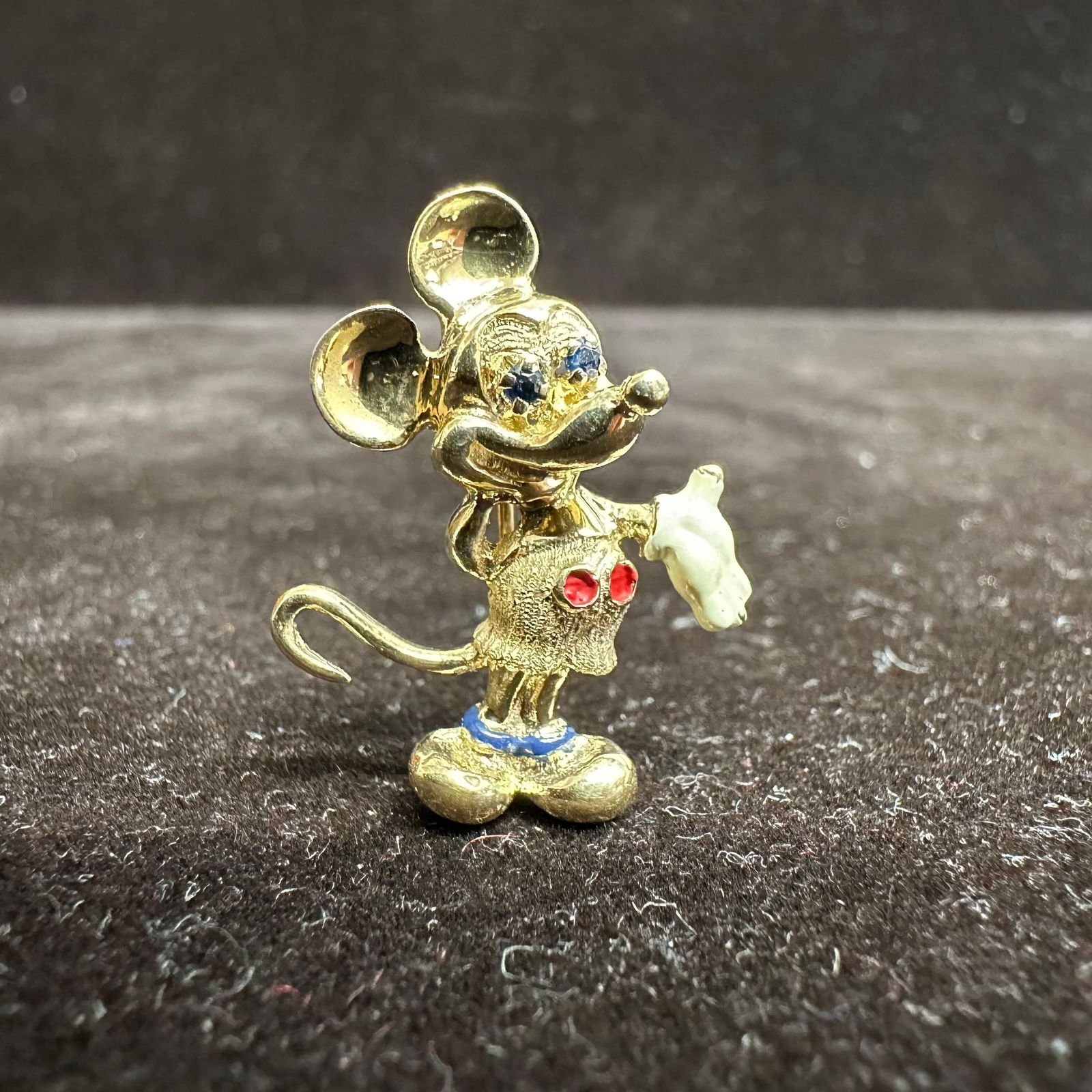 Walt Disney Productions Mickey Mouse 14K Blue Sapphire and Enamel Gold Brooch: This item is in good pre-owned, previously used/displayed condition with noticeable light wear and surface scratches. Please reference all photos for full details. This piece of jewelry has been teste