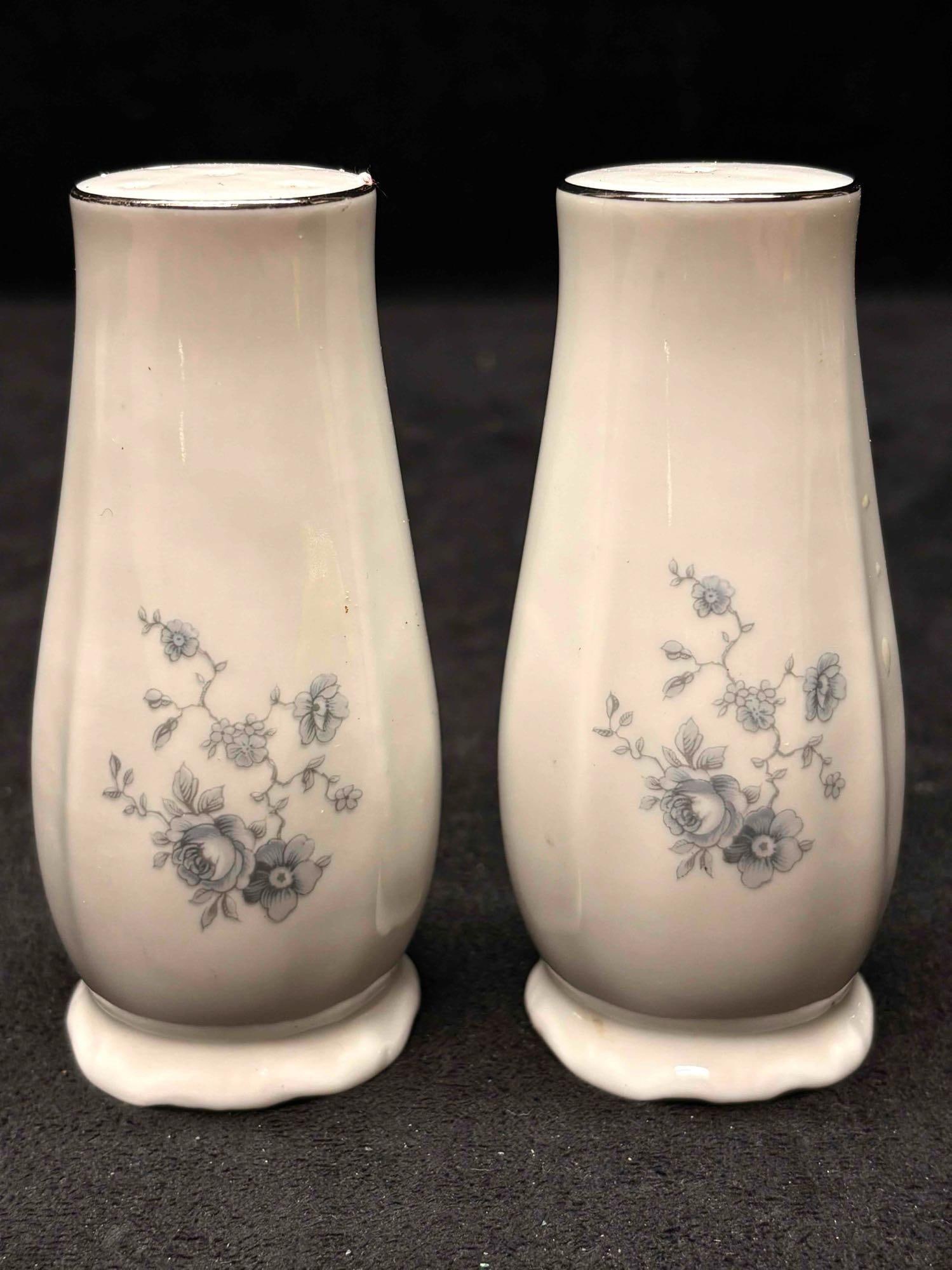 2pc Vintage Johann Haviland Blue Garland Salt and Pepper Shaker Set: The porcelain Salt and Pepper Shaker set features small blue Garland patterns that was commonly produced during the mid-1970s to early 1990s in Bavaria, Germany. The set is in good conditions with no
