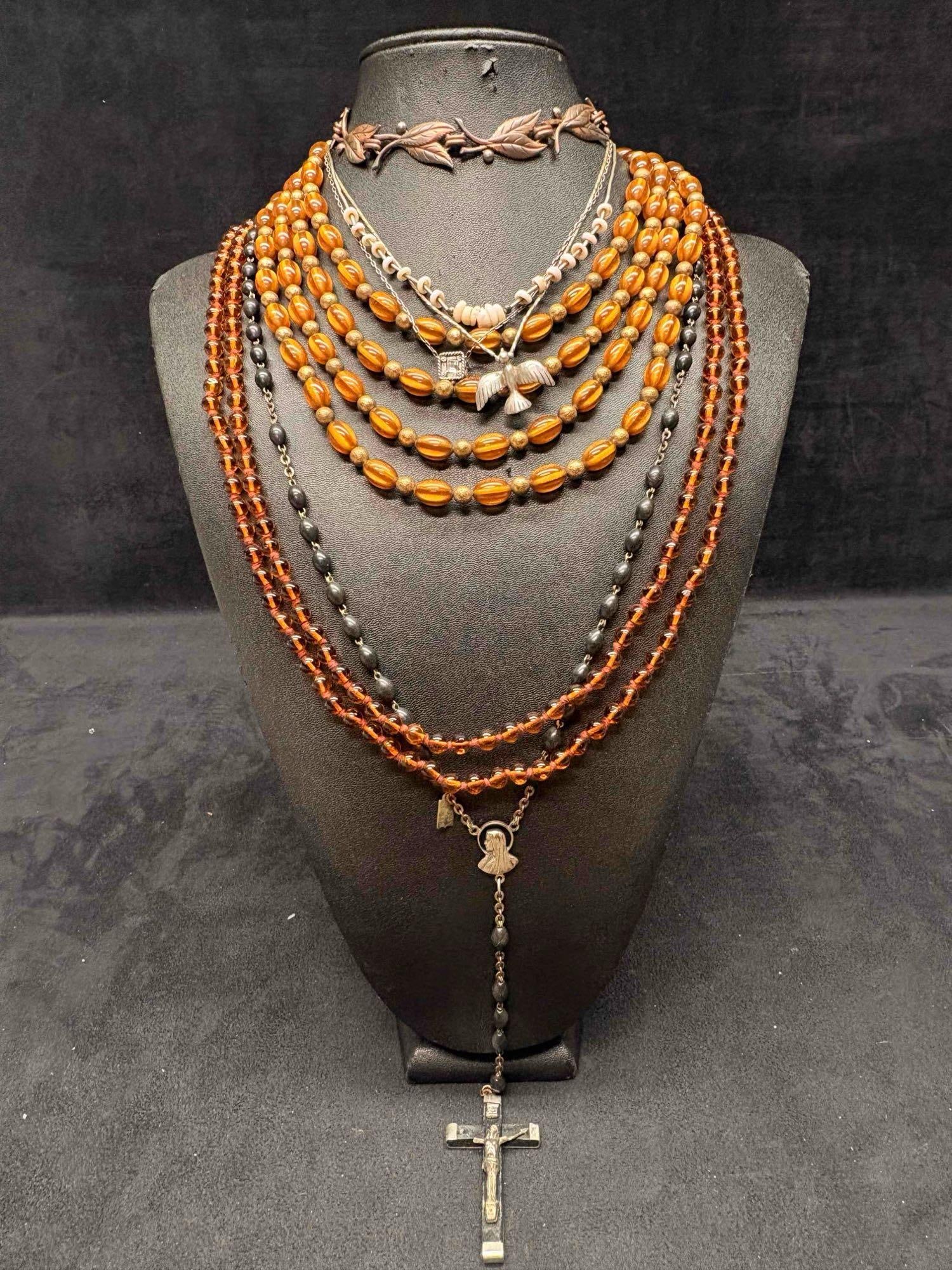 7pc Brown and Gold Nature Calls Necklace Lot: This lot consists of 7 pre-owned costume jewelry necklaces with typical wear from use. Please review images for context of the lots visual conditions. APPROX. WEIGHT: 7.6 OZ