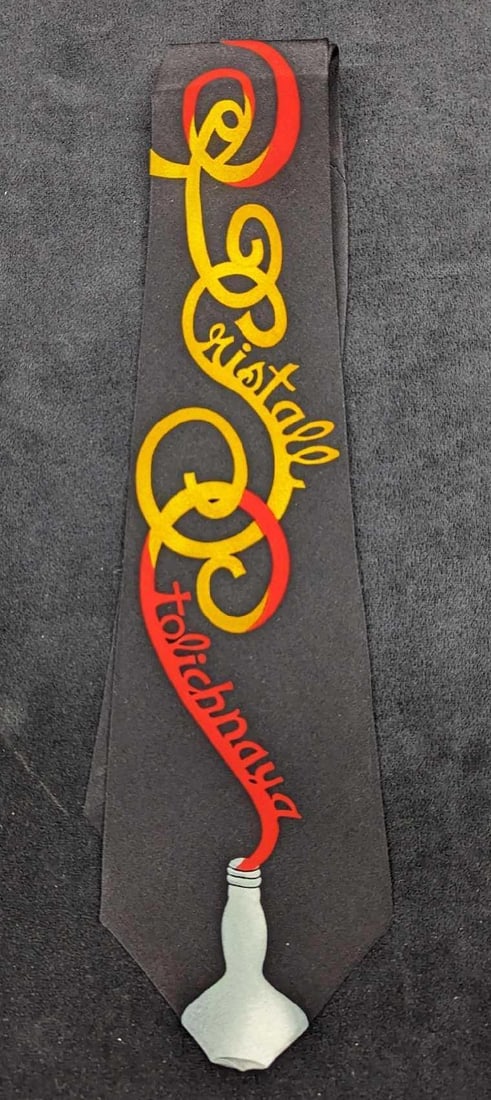 Stolichnaya Vodka Black Silk Tie New: Stolichnaya Vodka Black Silk Tie New Vintage 100% silk Stolichnaya Vodka Tie from the 1990s. This silk tie is still in the original packaging, and has never been used or worn. There is a small crease