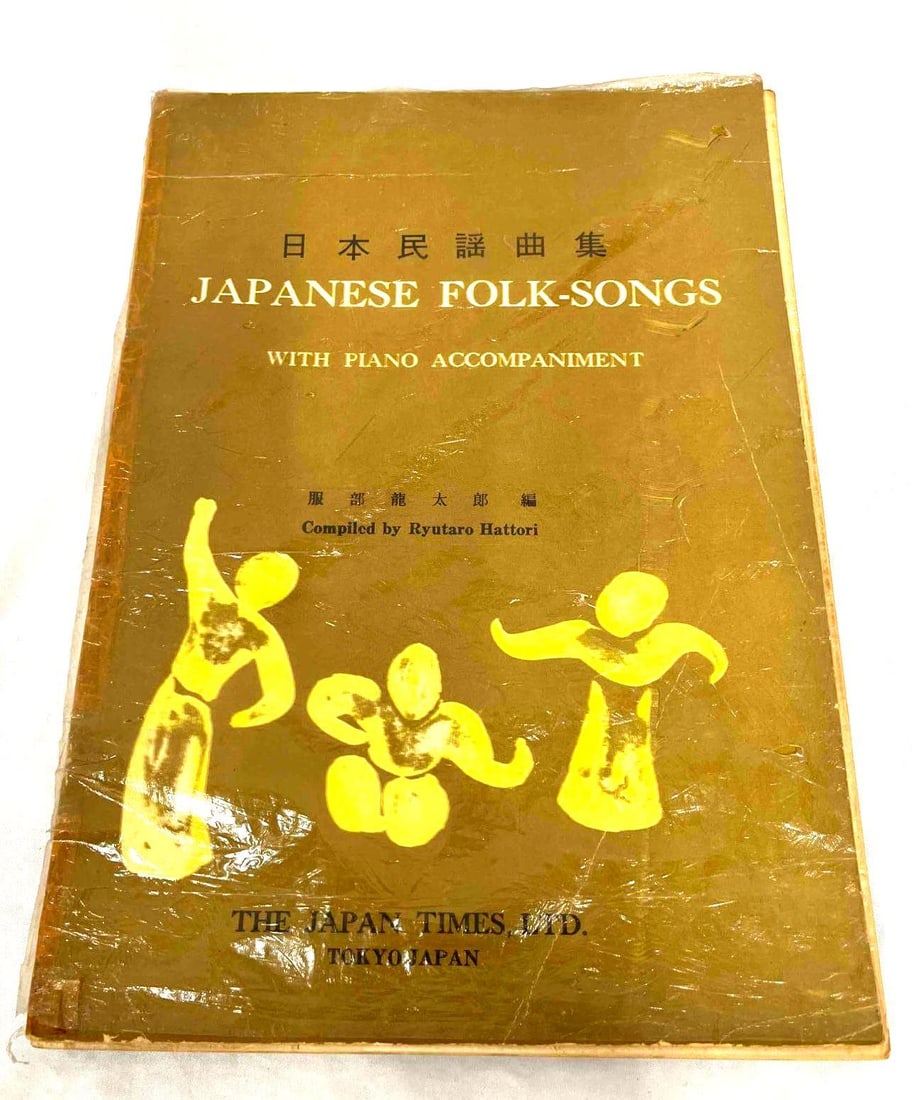 Folk-Songs With Piano Accompaniment Complied By Ruutaro Hattori: This lot contains a softcover edition of Japanese Folk-Songs With Piano Accompaniment Complied By Ruutaro Hattori. It is approx 11 3/4" x 8 1/2" and it weighs about 0.7lbs. Overall the soft cover