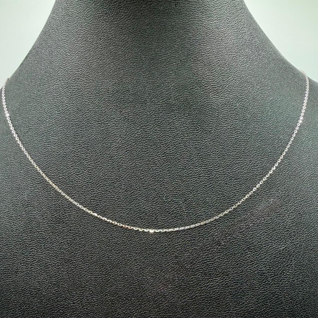 10k White Gold Dainty Chain Necklace: This piece of jewelry has been tested and researched prior to listing. Please view all our pictures they are part of our description. DETAILS: Metal - 10k GoldColor - Silver/White GoldStones -