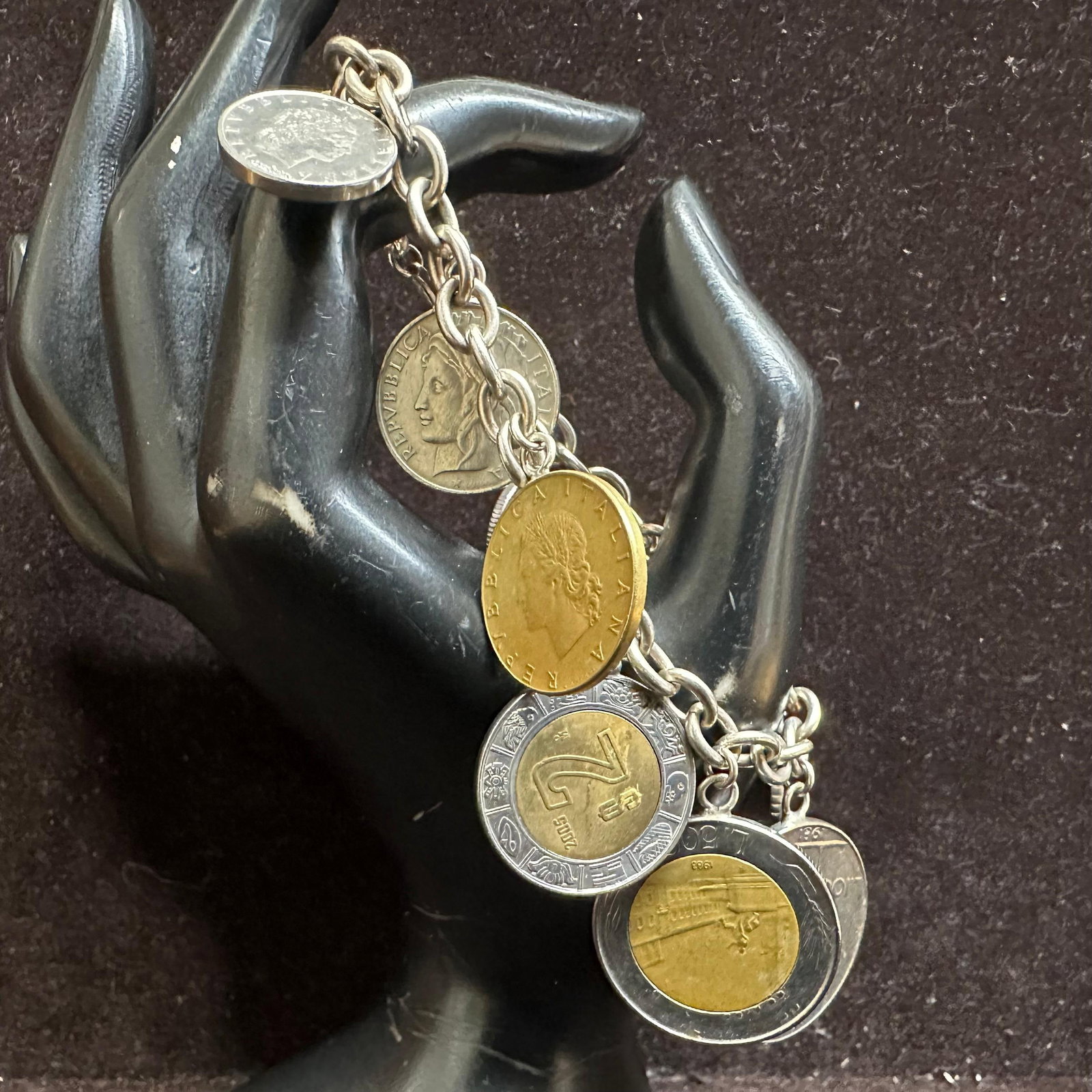 Milor Italy 925 Sterling Silver Italian Lire Coin Charm Bracelet P51: This item is in good pre-owned, previously used/displayed condition with noticeable light wear and surface scratches. Please reference all photos for full details. This piece of jewelry has been teste
