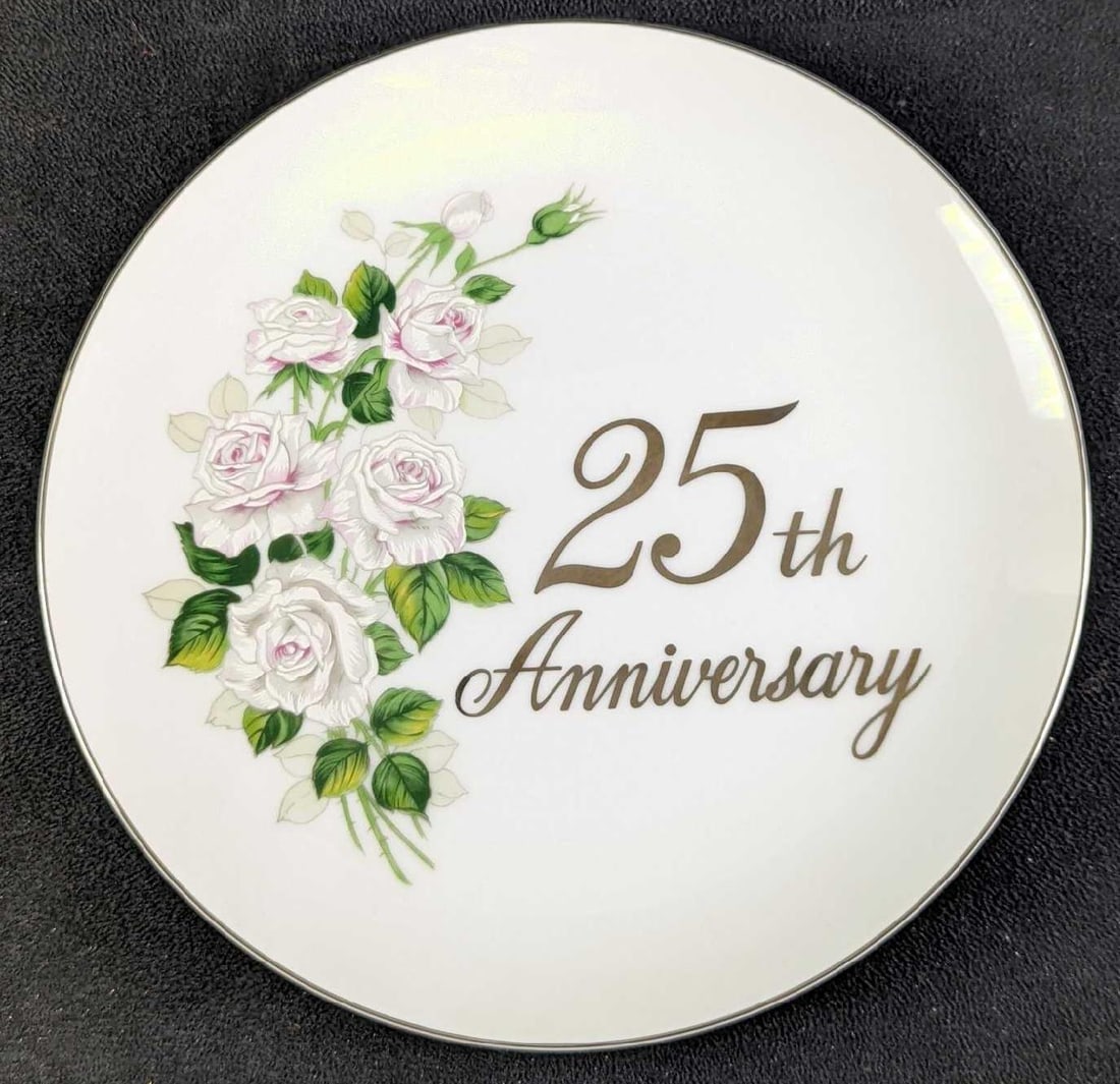 Papel Fine China 25th Anniversary Wedding Plate: Papel Fine China 25th Anniversary Wedding Plate. This plate is approx 9 1/4" x 9 1/4" x 3/4" and it weighs 1.05lb. The plate is in a good, used condition with no chips or cracks. The plate has a hook