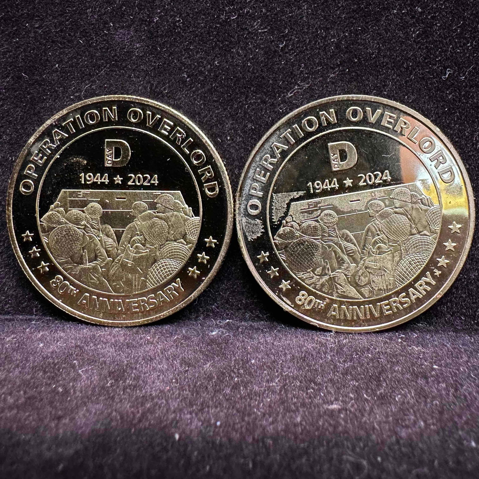 Operation Overload 80th Anniversary D-Day Commemorative Coin Set: Gold toned coins marked 1944 2024. In good pre-owned condition, tape residue, minor wear, and light surface scratches. Please reference all photos for full details. Measures: 1 1/2" width.