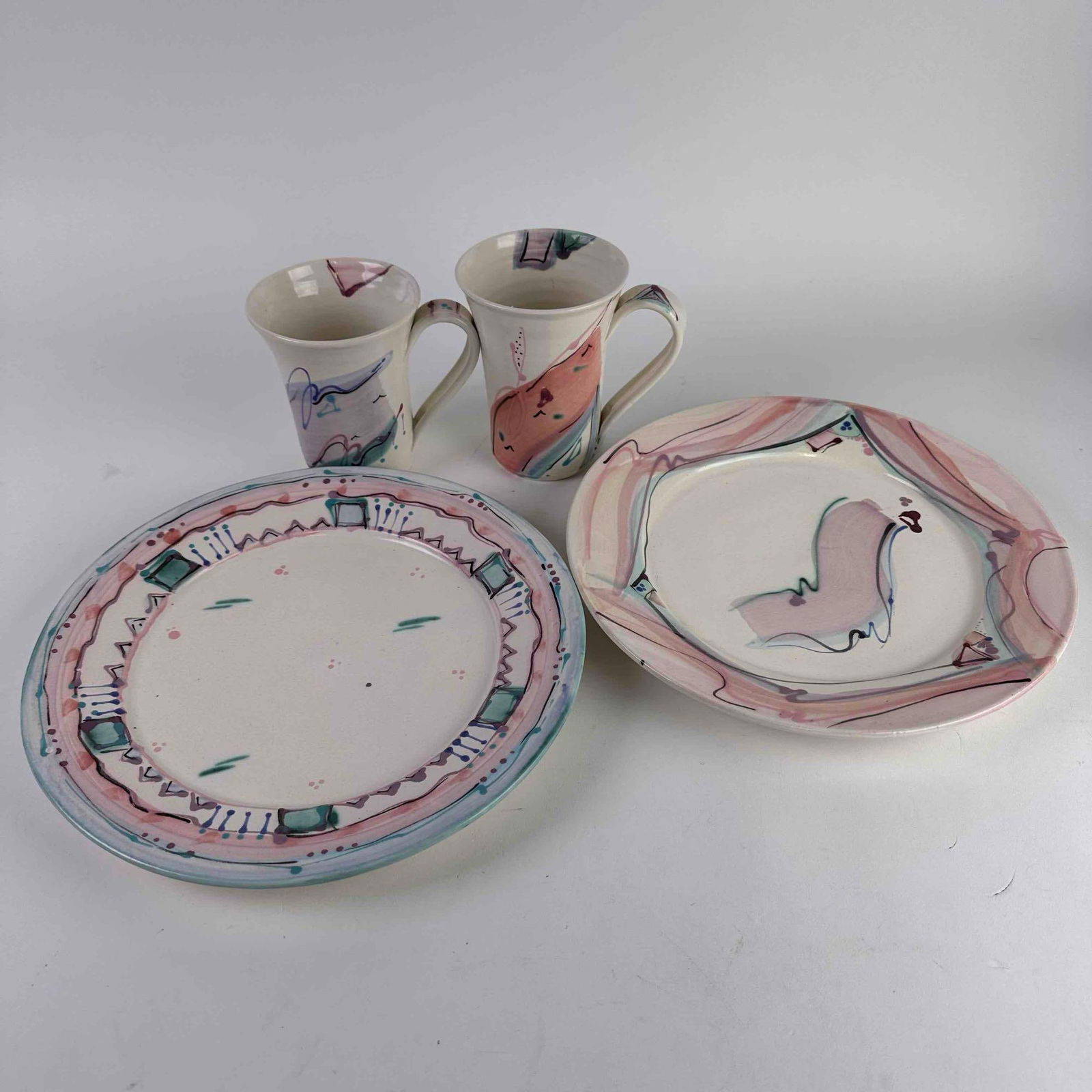 Color Ceramic SJP Pottery Plate Cup Set Handmade Pink Teal Splatter Paint Style: Color Ceramic SJP Pottery Plate Cup Set Handmade Pink Teal Splatter Paint Style. This dinnerware set includes two dinner plates and two cup mugs, each with a unique handmade design with beautiful pink