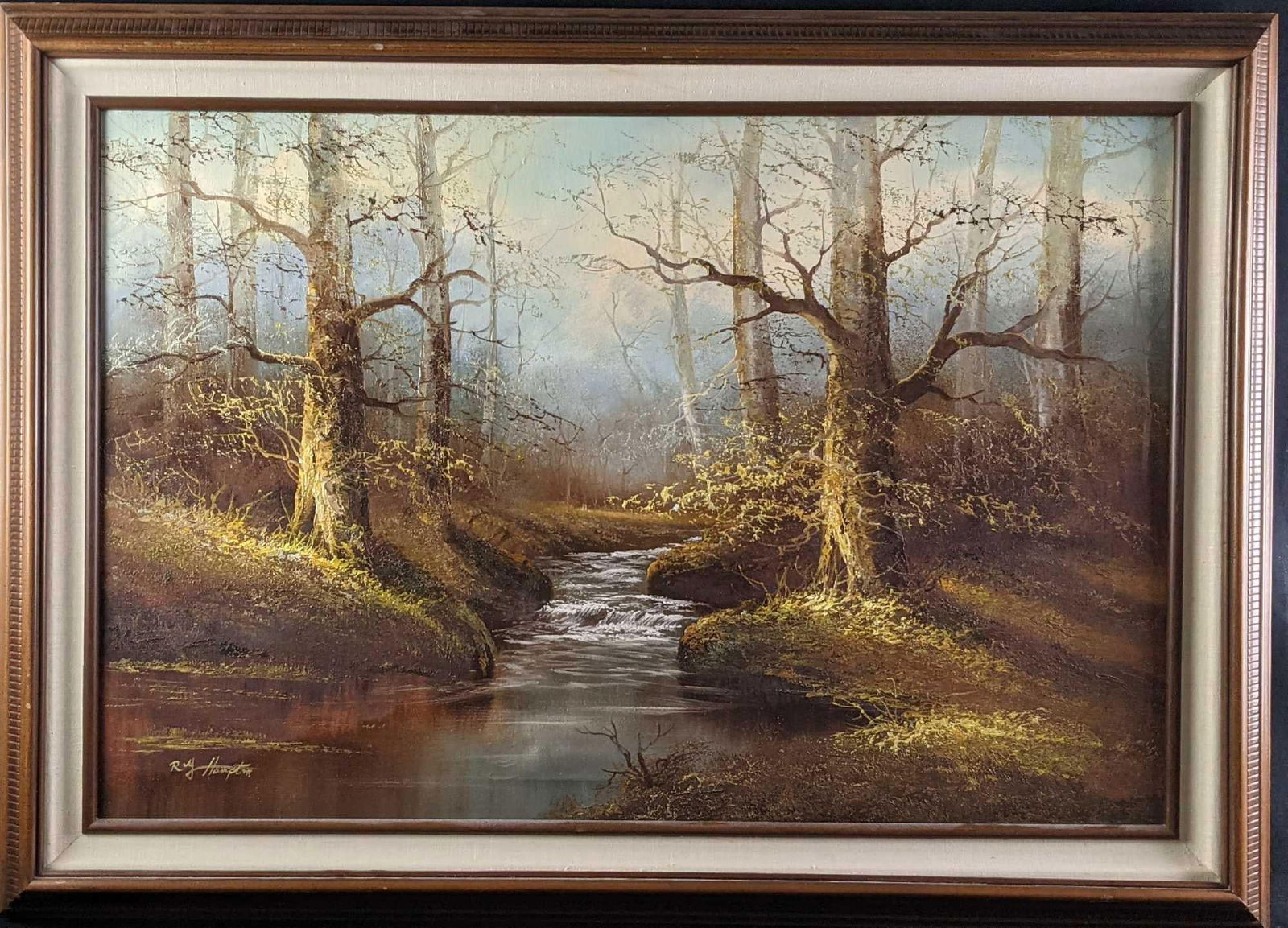 Original Framed Oil On Canvas Roy Hampton Landscape: This is an original framed oil on canvas by artist Roy Hampton. This is of a forest with a river running down the middle of it. The artist signed the bottom left. The original is approx 42 3/4" x