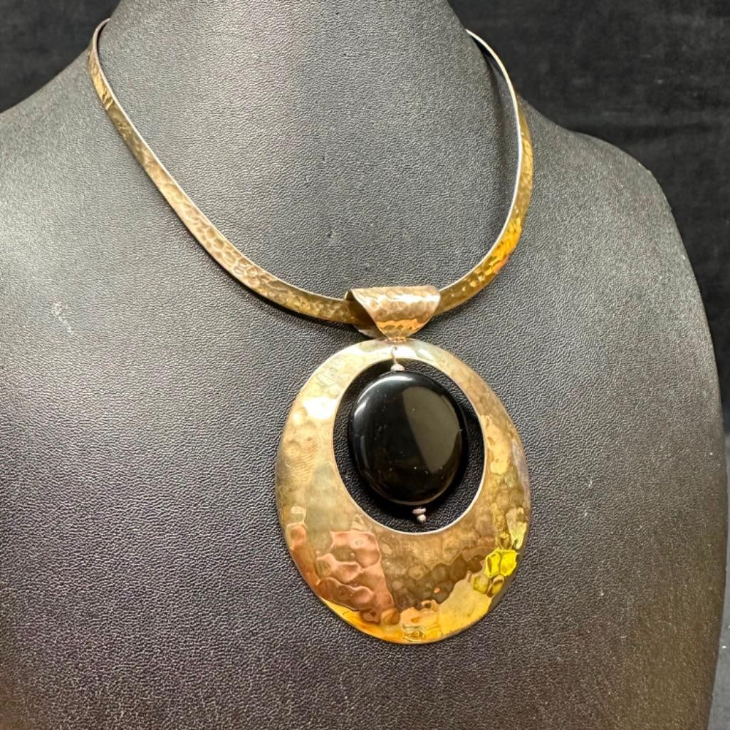 Sterling Onyx Concentric Pendant Necklace: This piece of jewelry has been tested and researched prior to listing. Please view all our pictures they are part of our description. DETAILS: Metal - Sterling Silver Color - Silver Stones - onyx Hal