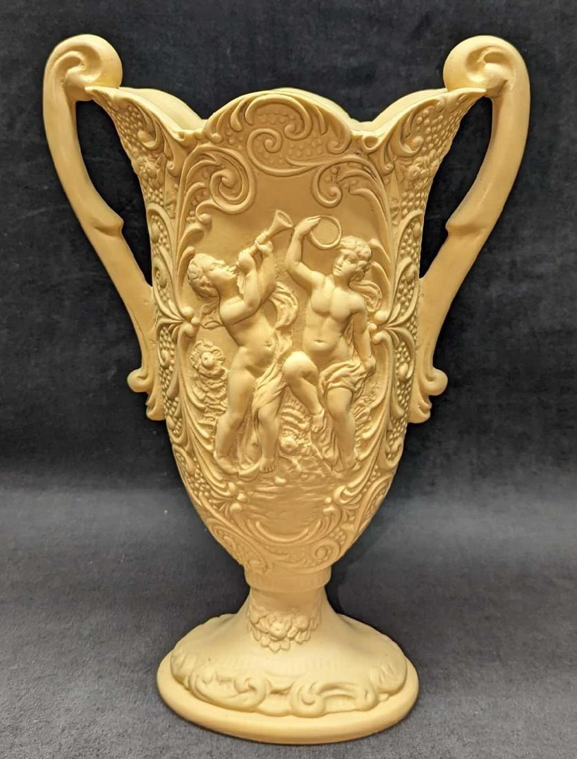 Vintage Resin Romanesque Style Vase With Handles: Vintage Resin Romanesque Style Vase With Handles. This is approx 9" x 4" x 13 1/4" and it weighs 5.23 lbs. There are some markings on the vase. 