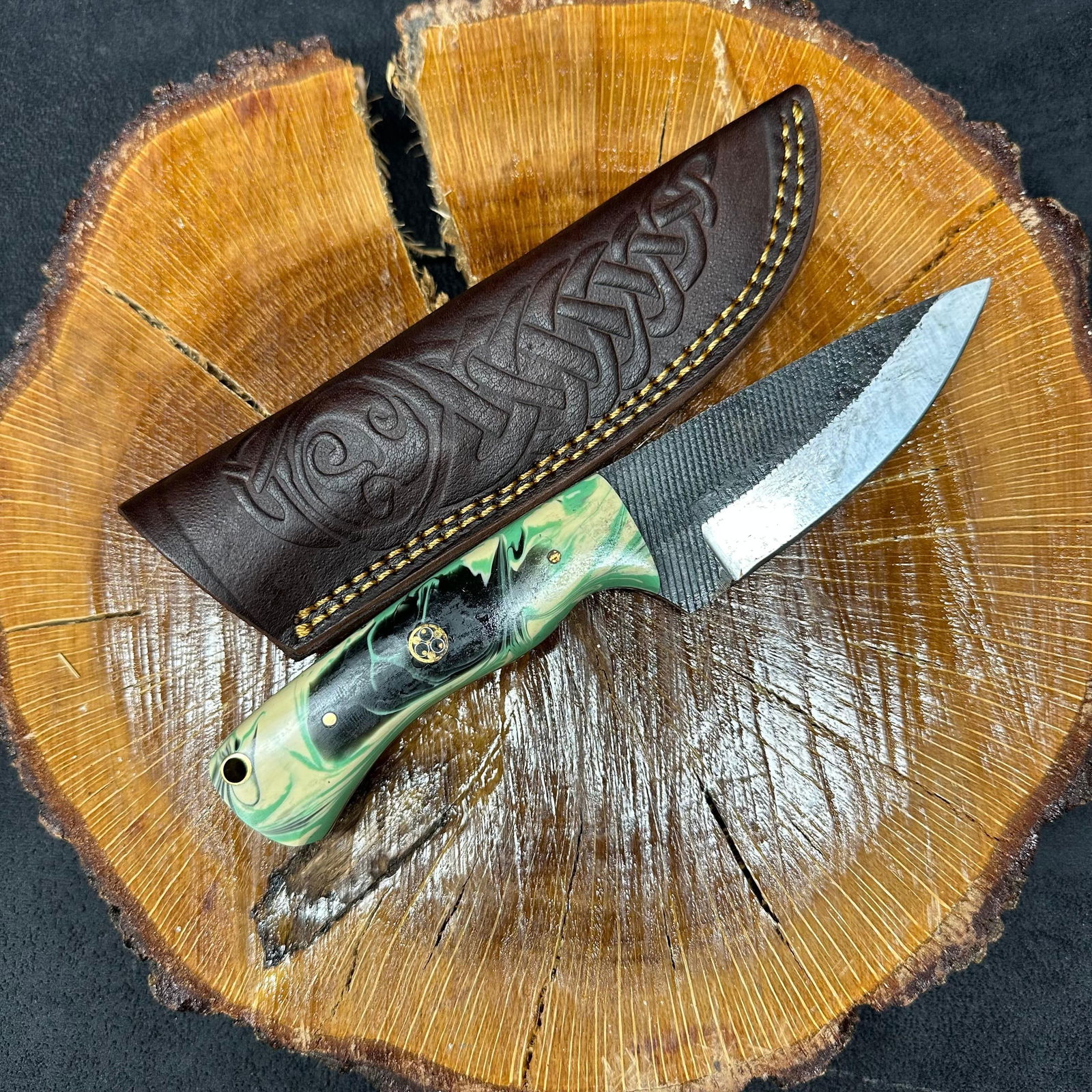 Green Black Cream Colored Handle MHS Cutlery Fixed Blade Knife Q14: Fixed blade knife by MHS Cutlery featuring a textured steel blade and decorative spine work. The handle has a contoured, multi-colored wood/epoxy resin-style grip with metal mosaic pin accents. Includ