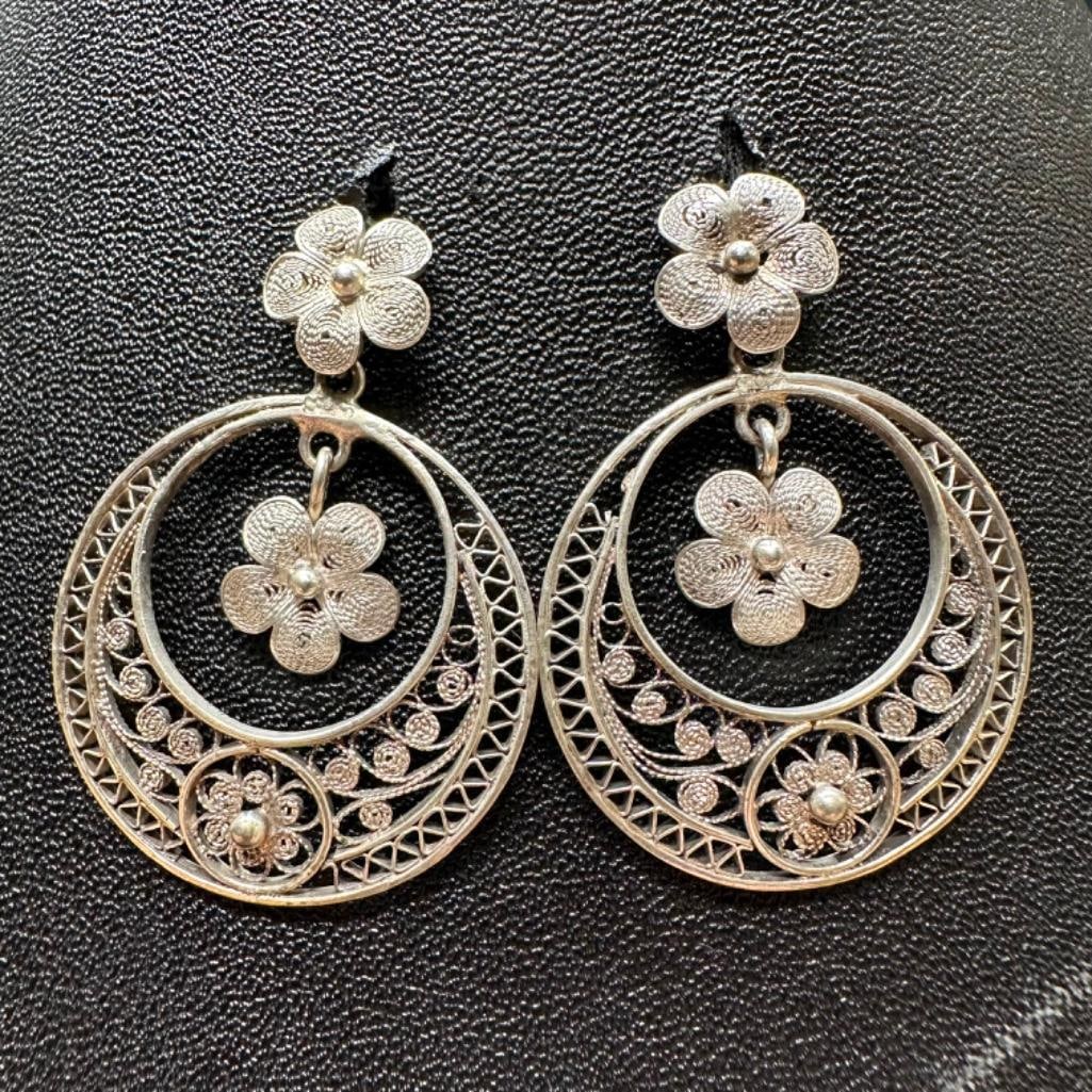 .800 Silver Crescent Flower Earrings: This piece of jewelry has been tested and researched prior to listing. Please view all our pictures they are part of our description. DETAILS: Metal - .800 SilverColor - SilverStones - noneHallmarks