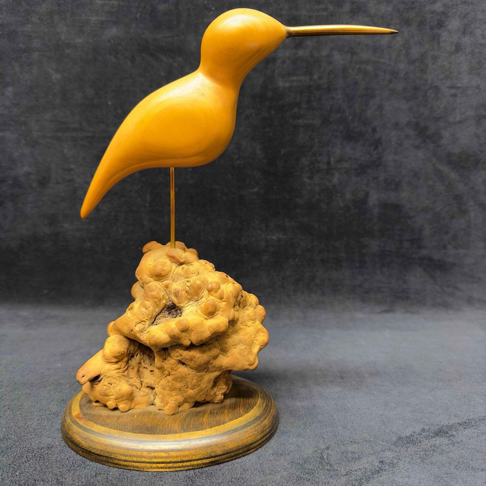William J Watson Wooden Bird Sculpture Sandpiper Burl Wood Art: William J Watson Wooden Bird Sculpture Sandpiper Burl Wood Art. Marked on the bottom William J. Watson Orlando, FL. Unique wood art featuring a wood sandpiper statue standing on a piece of burl wood o