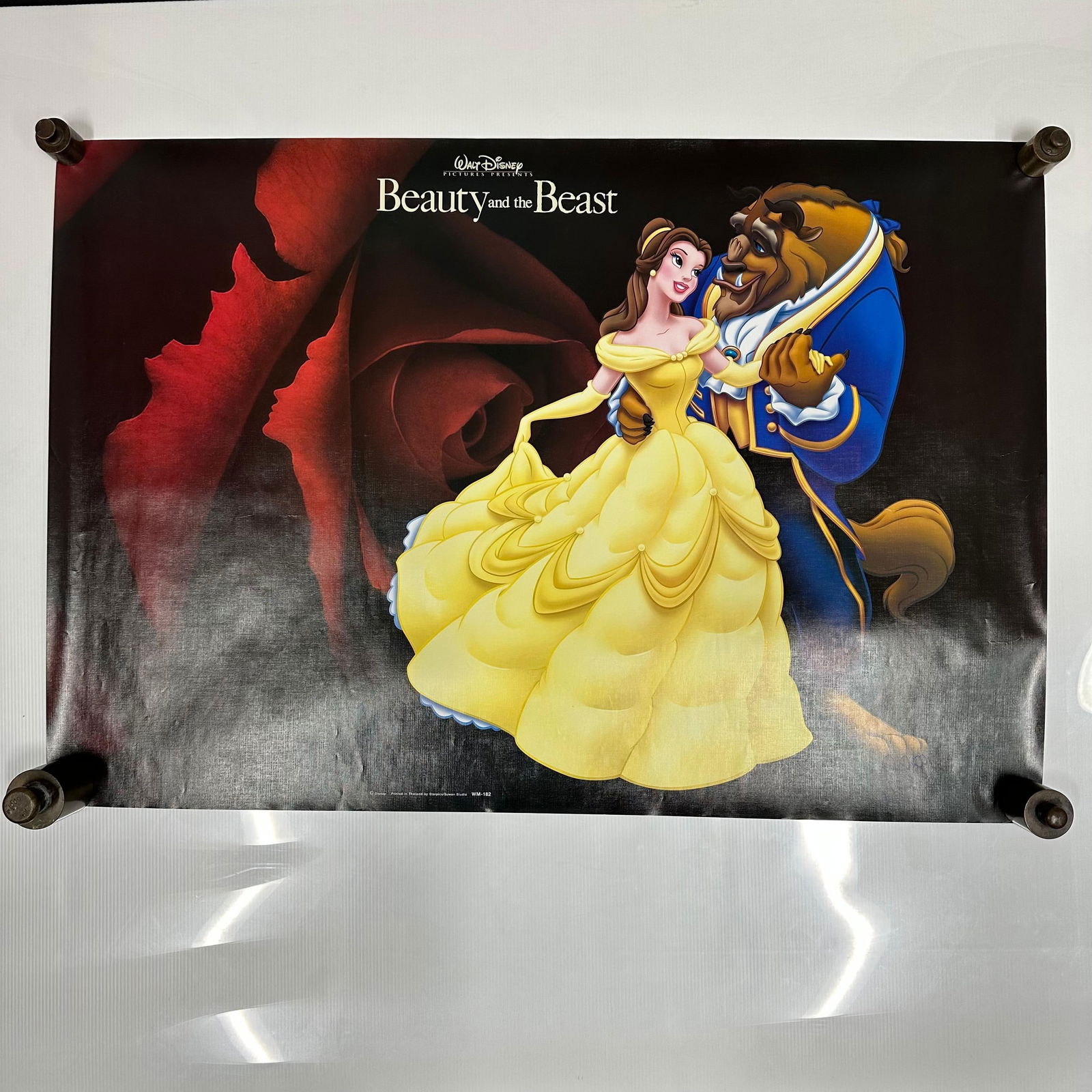 Walt Disney Beauty and the Beast Red Rose Promotional Poster Landscape WM-182: Original Walt Disney Beauty and the Beast promotional poster featuring Belle and the Beast in the iconic ballroom pose against an enchanted rose backdrop. Printed in Thailand by Starpics/Suwan Studio,
