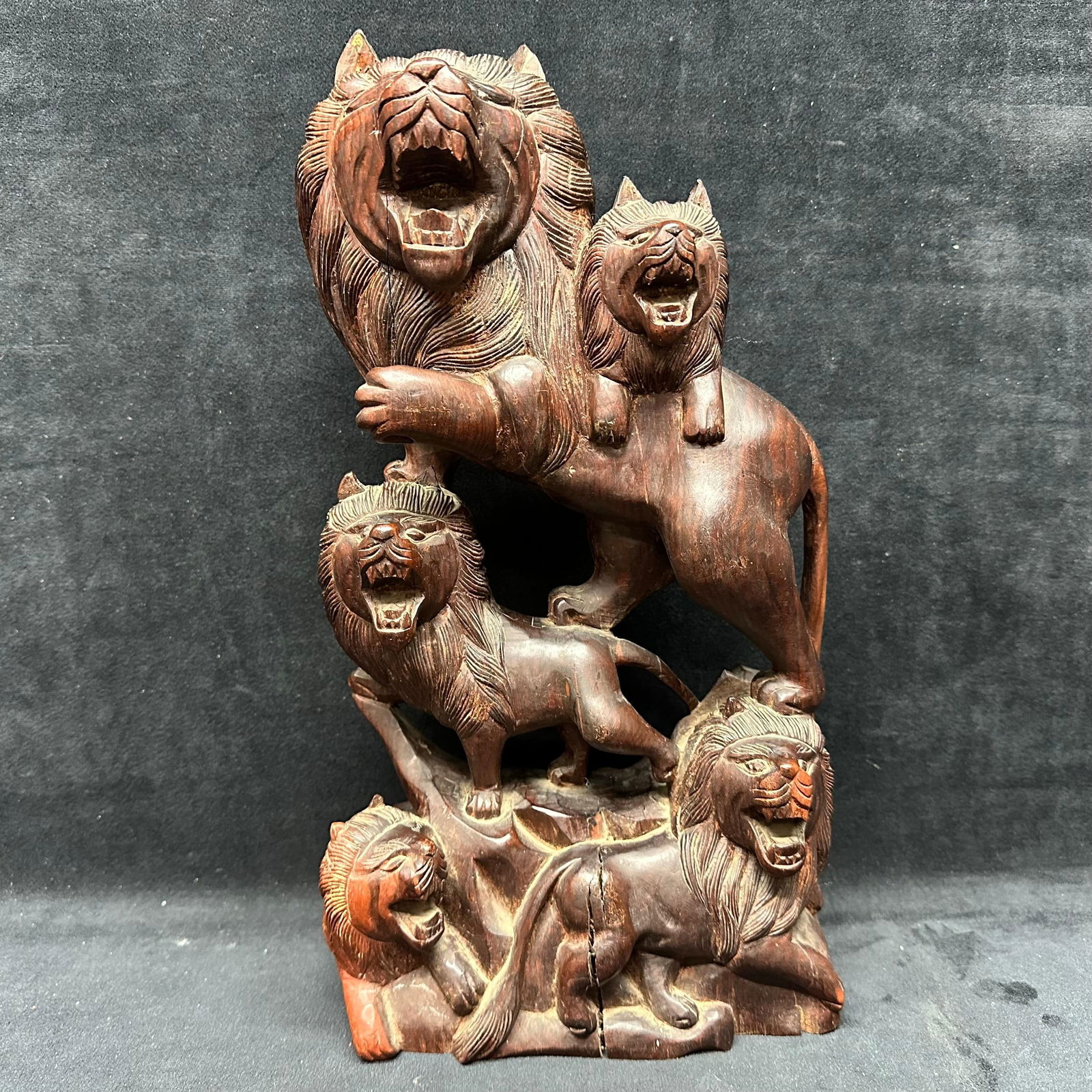 Carved Wooded Lion Pride Sculpture Folk Art Group Figure: Hand-carved wooden sculpture depicting a stacked group of lions in dynamic poses. The composition features multiple roaring lions carved from a single block or joined sections, with detailed manes,