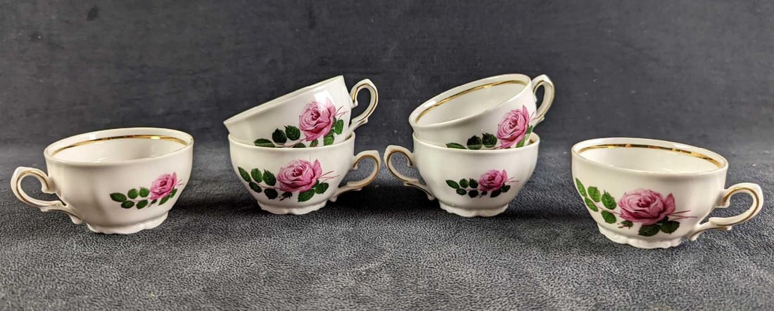 Six Winterling Bavaria German Fine China Demitasse Cups: Six Winterling Bavaria German Fine China Demitasse Cups. Each cup is approx 3 1/4" x 2 3/4" x 1 3/4" and holds three ounces. The total weight is 0.72lb. All are in good, used condition with one c