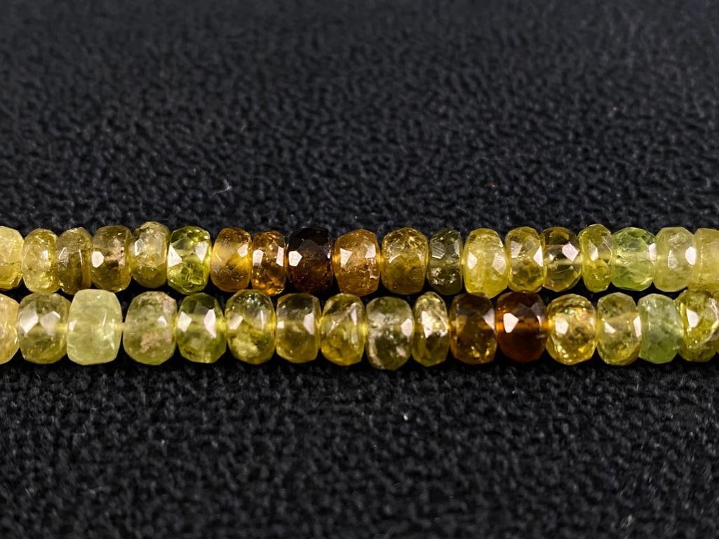 String of Green Garnet Beads: String of Green Garnet Beads DETAILS: Metal - none Color - green Size - 5.5-6 mm, 14.5"