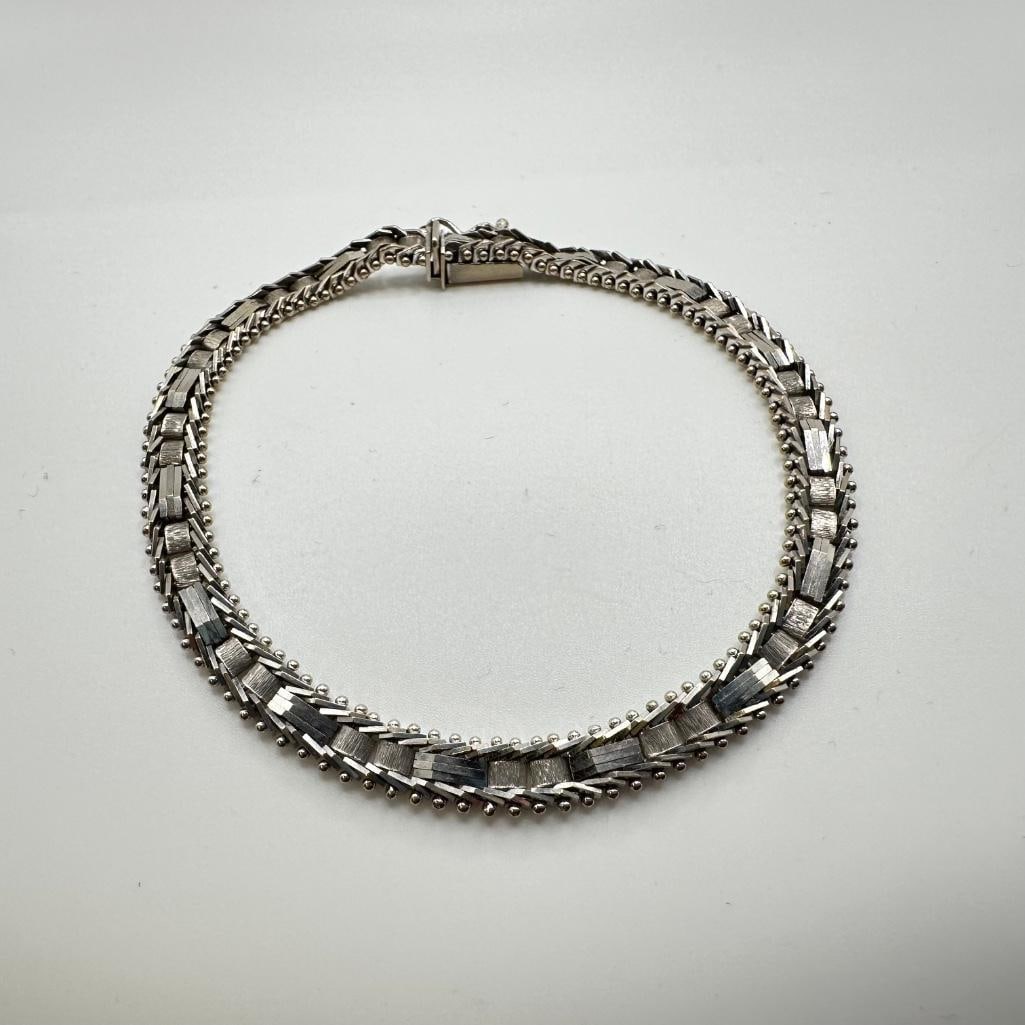 14k White Gold Weave Link Bracelet: This piece of jewelry has been tested and researched prior to listing. Please view all our pictures they are part of our description. DETAILS: Metal - 14k White Gold Color - White/Silver Stones - non