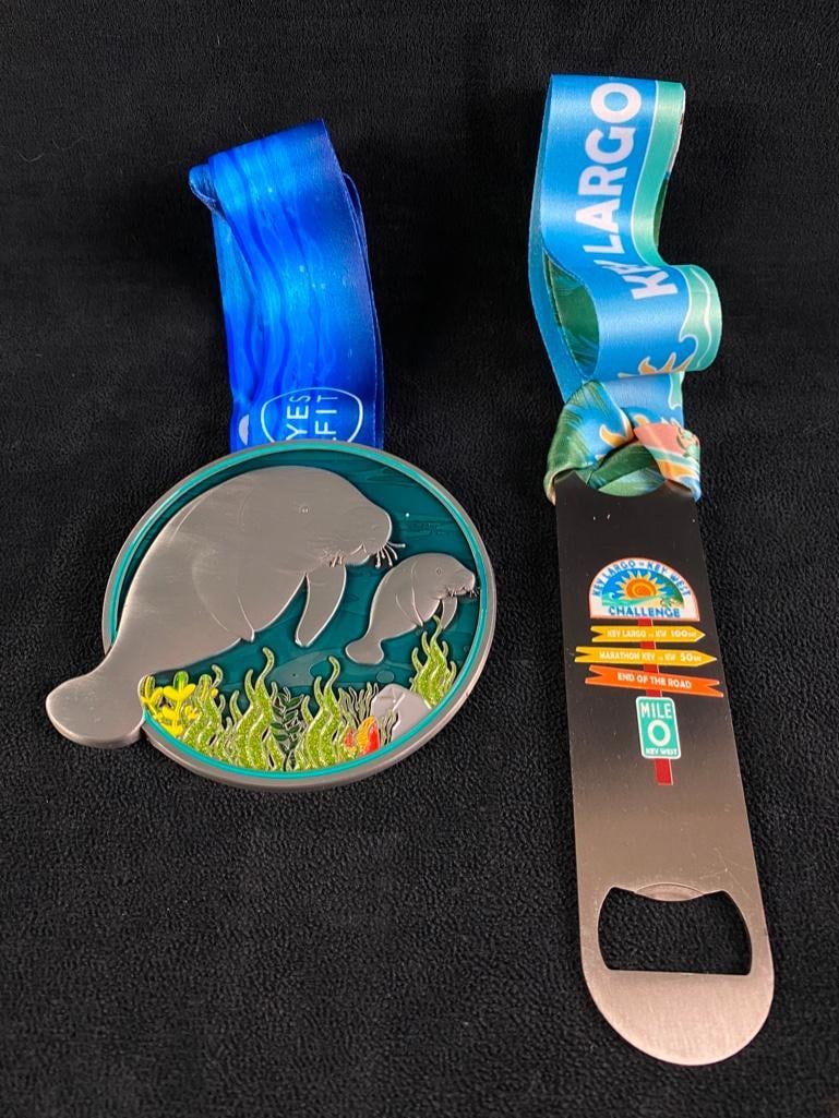 Pair of Florida Virtual Race Medals JB: Pair of Florida Virtual Race Medals Medals from two virtual races: The Manatees 68 Mile Challenge and the Key Largo to Key West Challenge. The medals feature colorful designs, cool shapes, and high q