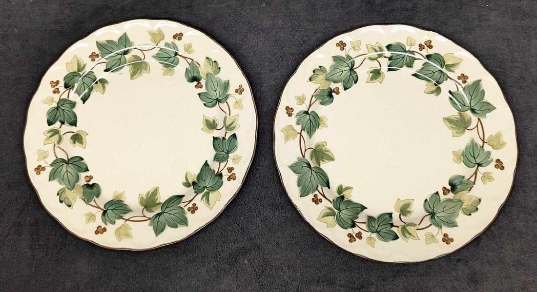 2 Retired Nikko Greenwood Dinner Plates D: 2 Retired Nikko Greenwood Dinner Plates D. This series was released from the year 1995 to the year 2004. Each is approx 10 1/4" x 10 1/4" x 1". The total weight is 2.89 lbs. The plates have some