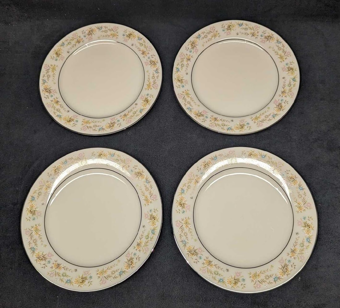 4 Retired Noritake Blossom Time Salad Plates C: 4 Retired Noritake Blossom Time Salad Plates C. Each plate is approx 8 3/8" x 8 3/8" x 3/4" and the total weight is 3.05 lbs. The bowls have no chips or cracks. The "Blossom Time" design was