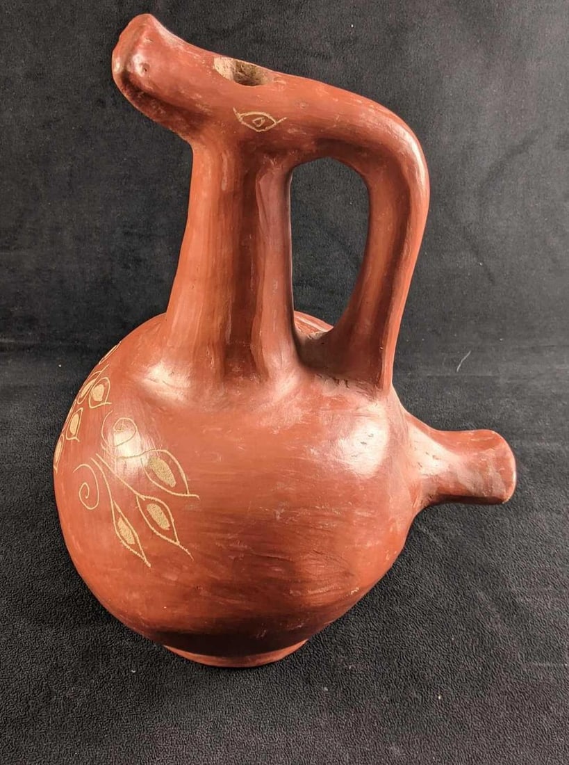 Clay Water Jug With Leaf Designs Red Clay Botijo: Clay Water Jug With Leaf Designs Red Clay Botijo This red clay botijo can be used for decoration but these were traditionally used to hold water. This is in good condition with no known damage. This b