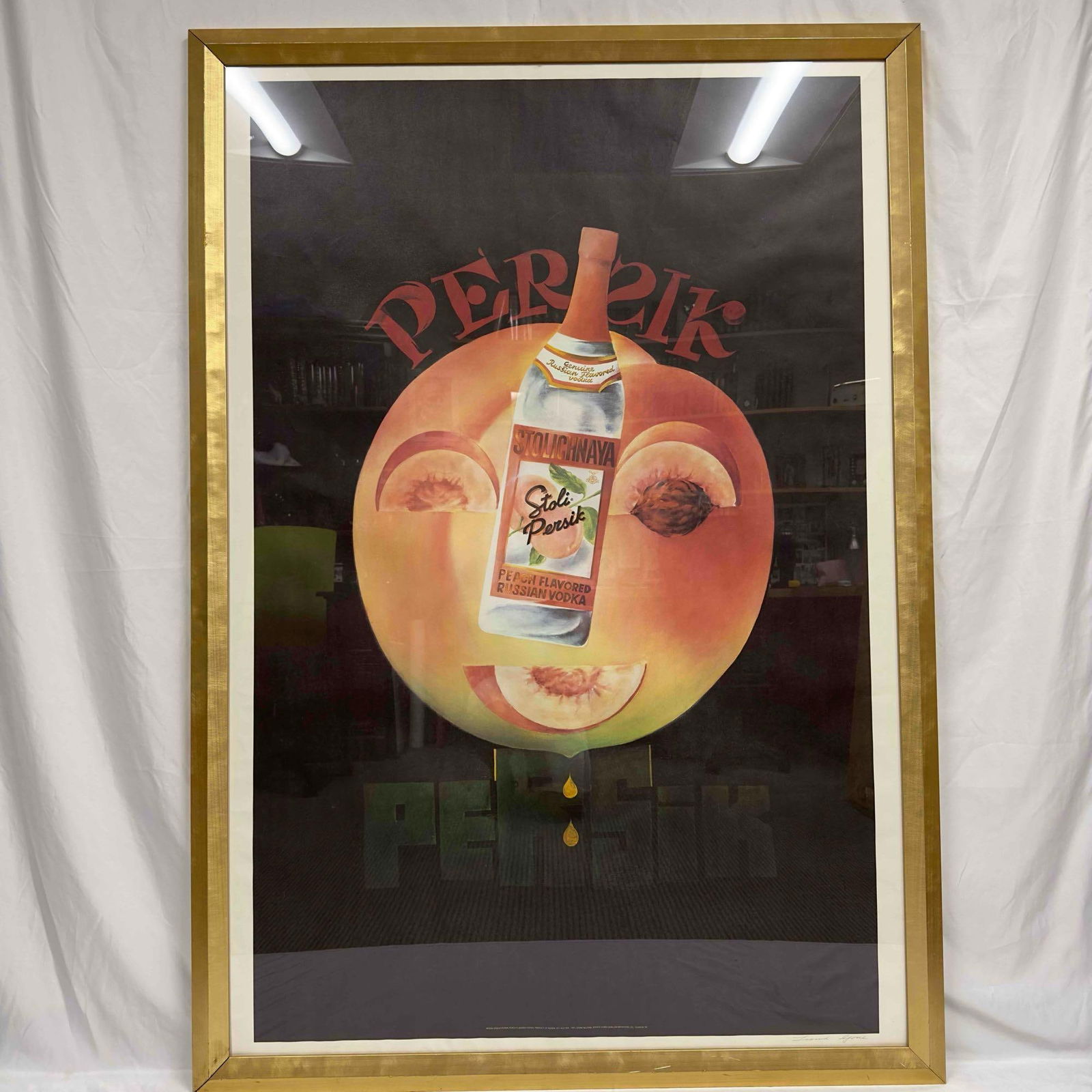 Stolichnaya Stoli Persik Peach Russian Vodka Advertisement Large Signed Print Poster: Stolichnaya Stoli Persik Peach Russian Vodka Advertisement Large Signed Print Poster. Artist signed by Leonid Gore on the bottom right of the print poster. The frame is a little nicked up on the corne