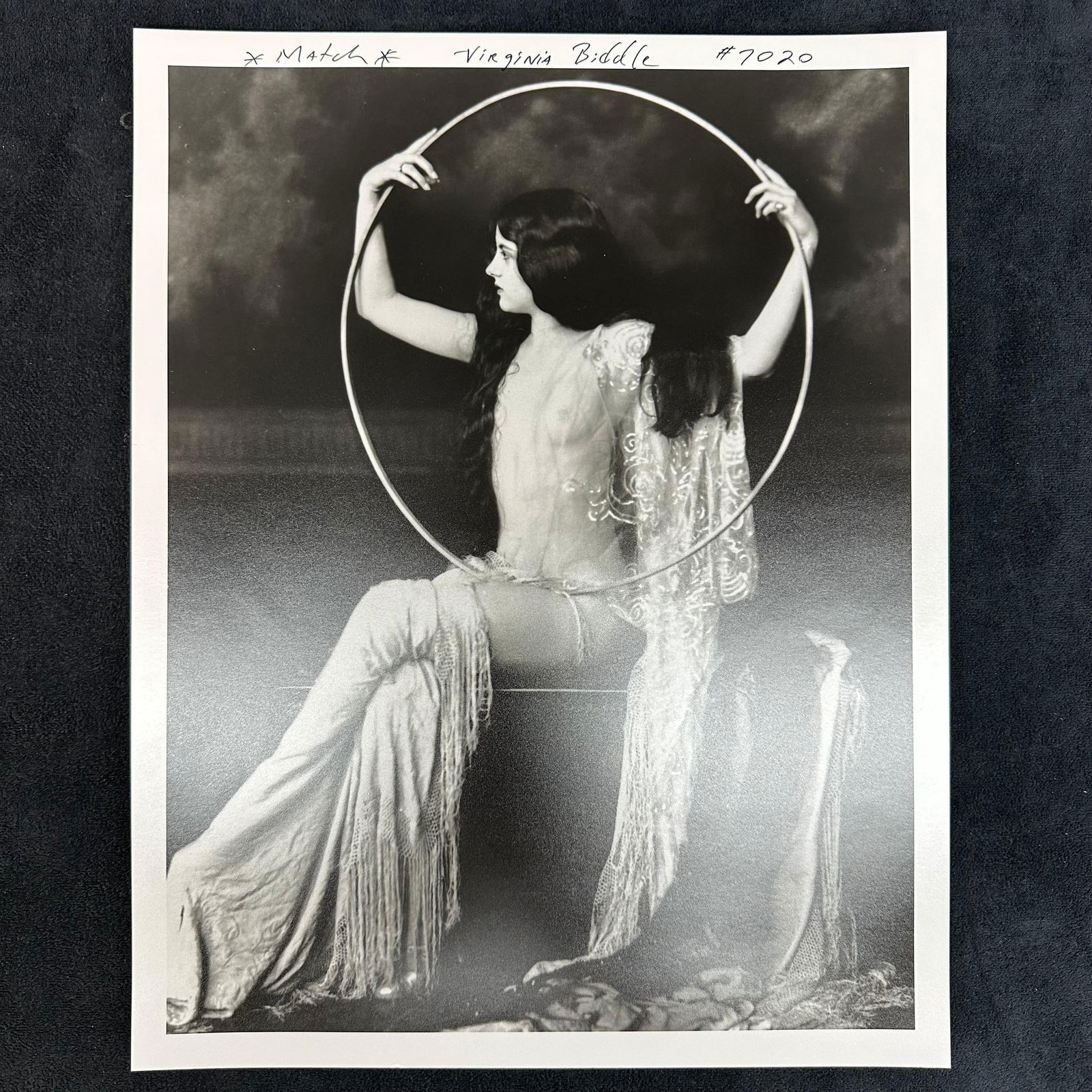 Analog Black and White Photo Print Virginia Biddle Ziegfeld Follies Performer Nude Portrait: Black-and-white analog photo print of Virginia Biddle, a celebrated performer from the legendary Ziegfeld Follies. The image depicts Biddle in an artistic pose, framed within a circular prop, wearing