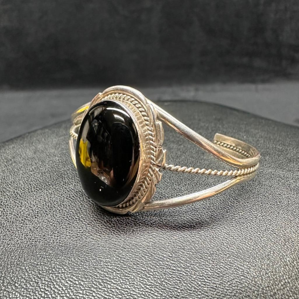 Sterling Black Resin Cuff Bracelet: This piece of jewelry has been tested and researched prior to listing. Please view all our pictures they are part of our description. DETAILS: Metal - Sterling SilverColor - SilverStones -