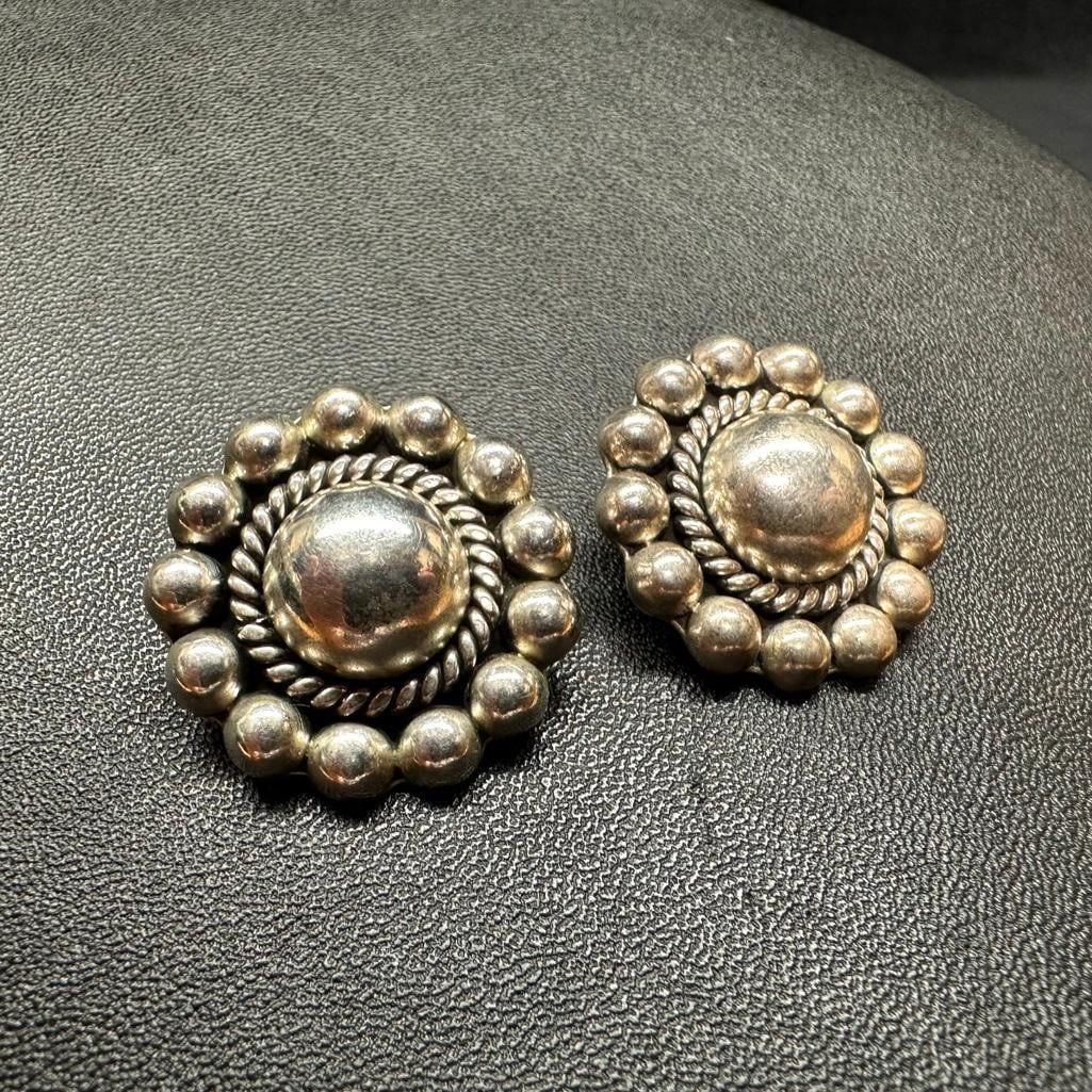 Sterling Silver Round Clip-On Earrings: This piece of jewelry has been tested and researched prior to listing. Please view all our pictures they are part of our description. DETAILS: Metal - Sterling Silver Color - Silver Stones - none Hal
