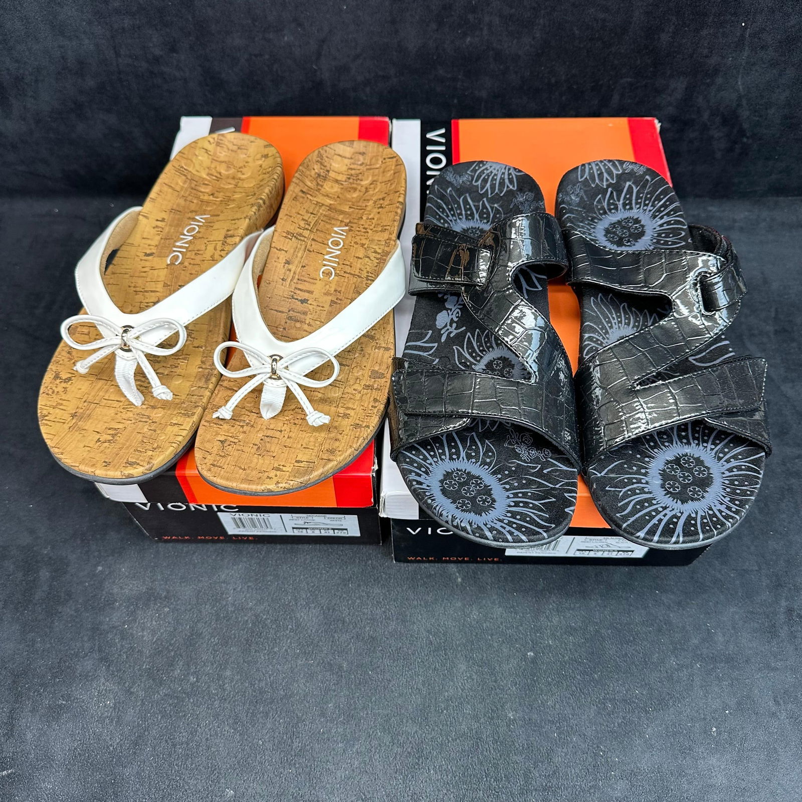 Vionic Women’s Sandals Lot 2 Pairs Rest Cassie White Thong and Black Rest Lauren Slides Size 10: Set of two pairs of Vionic women’s comfort sandals, both size 10, each offering stylish support and signature orthotic design. Includes: • Vionic Rest Cassie white thong sandals featuring