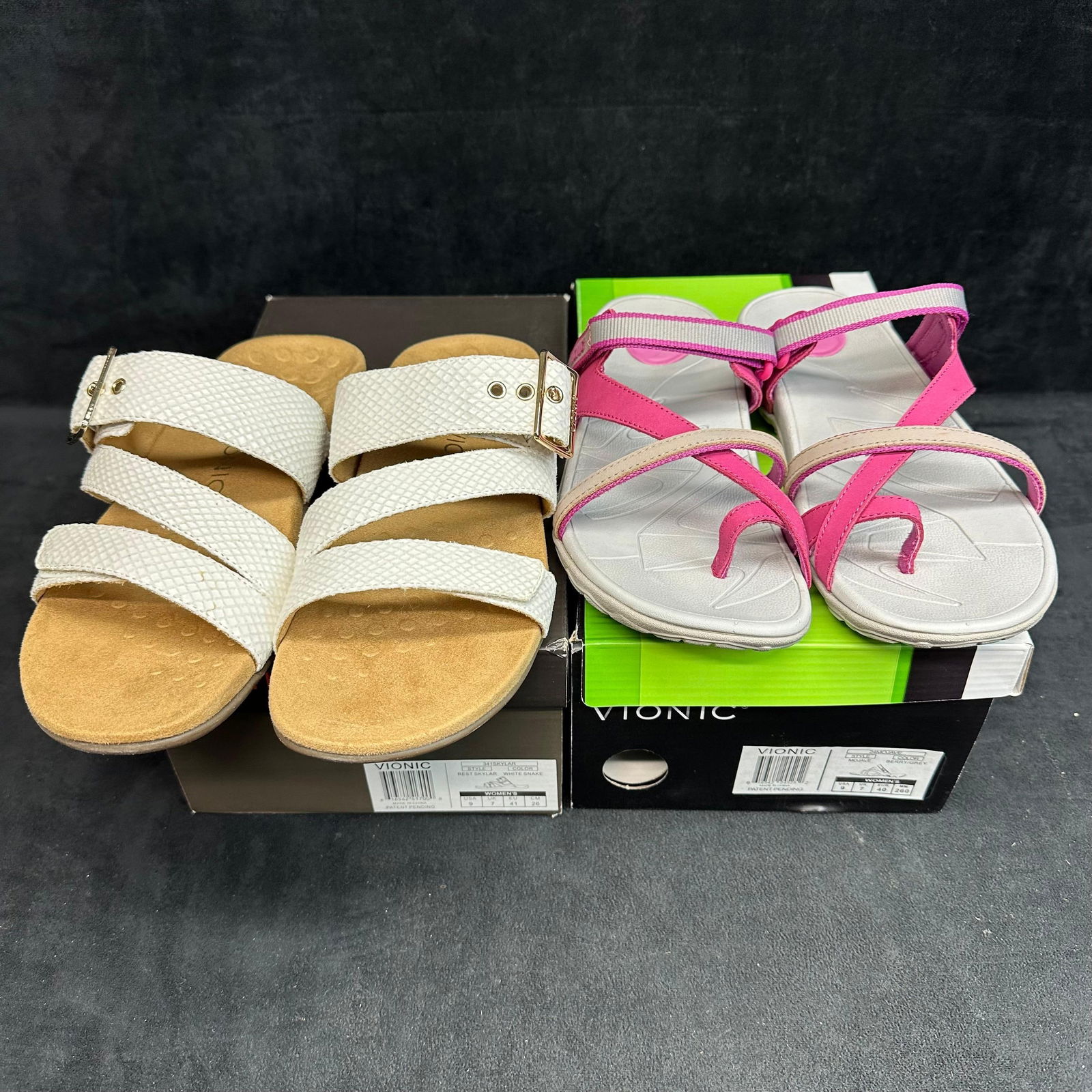 Vionic Women’s Sandals Lot 2 Pairs White Strappy Slide and Pink Gray Active Sandal: Pair of women’s Vionic sandals, both offering premium comfort with orthotic support and stylish versatility. Includes: • Vionic White Strappy Slides – Elegant three-strap design with