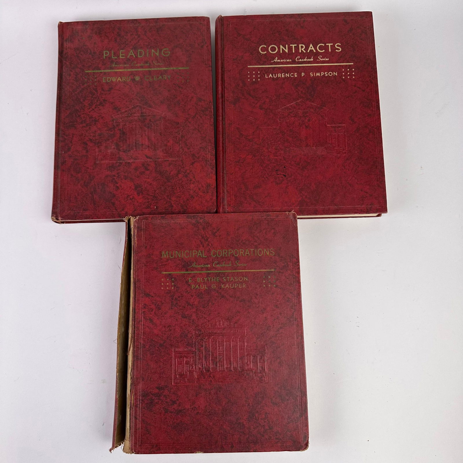 Three Volumes American Casebook Series Cleary Simpson Stason and Kauper Hardcover Set: Group of three vintage American Casebook Series law textbooks published by West Publishing Co., St. Paul, Minnesota. Includes: Cases on Pleading, Second Edition, by Edward W. Cleary. 1955. Cases on th